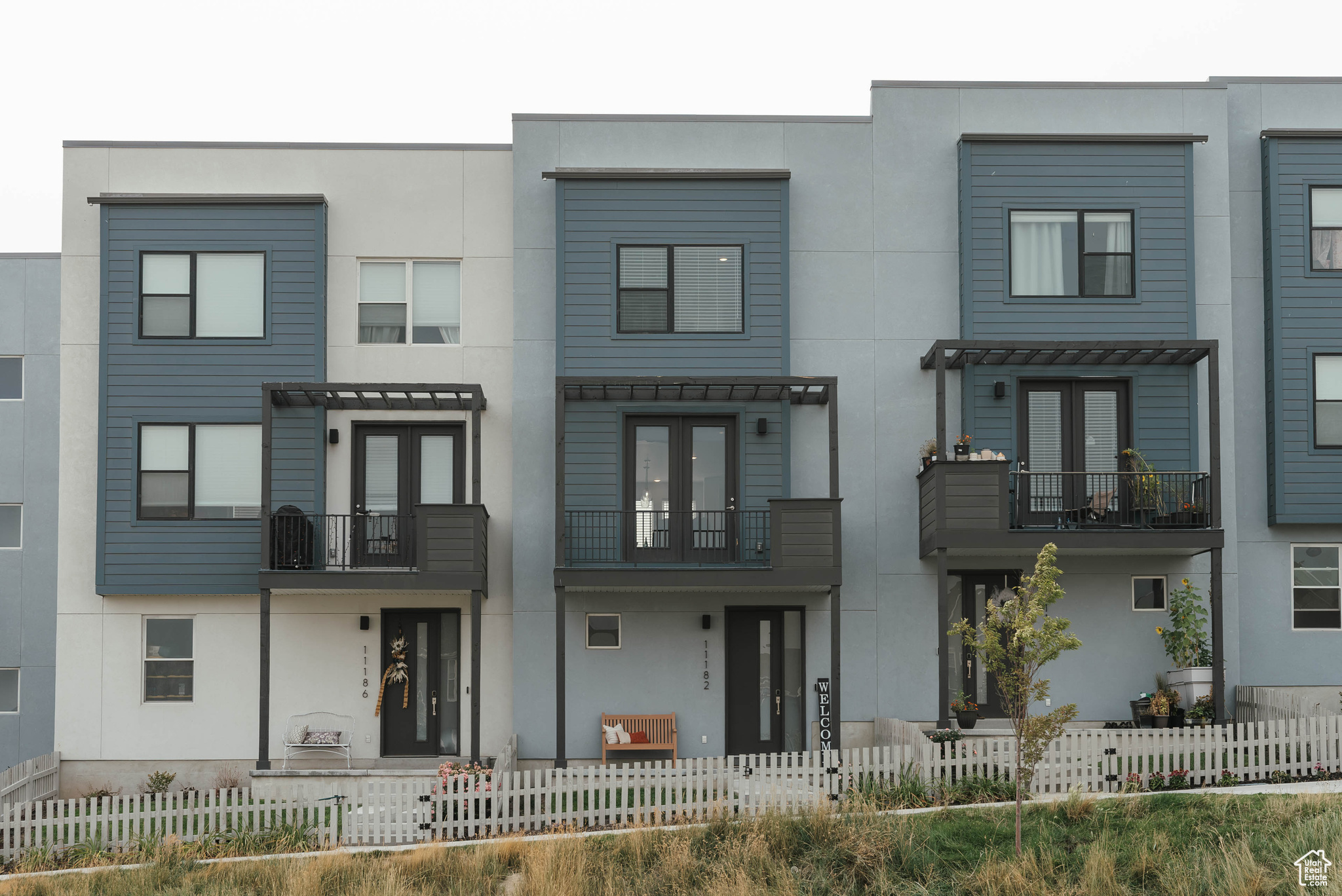 View of front of home with a balcony