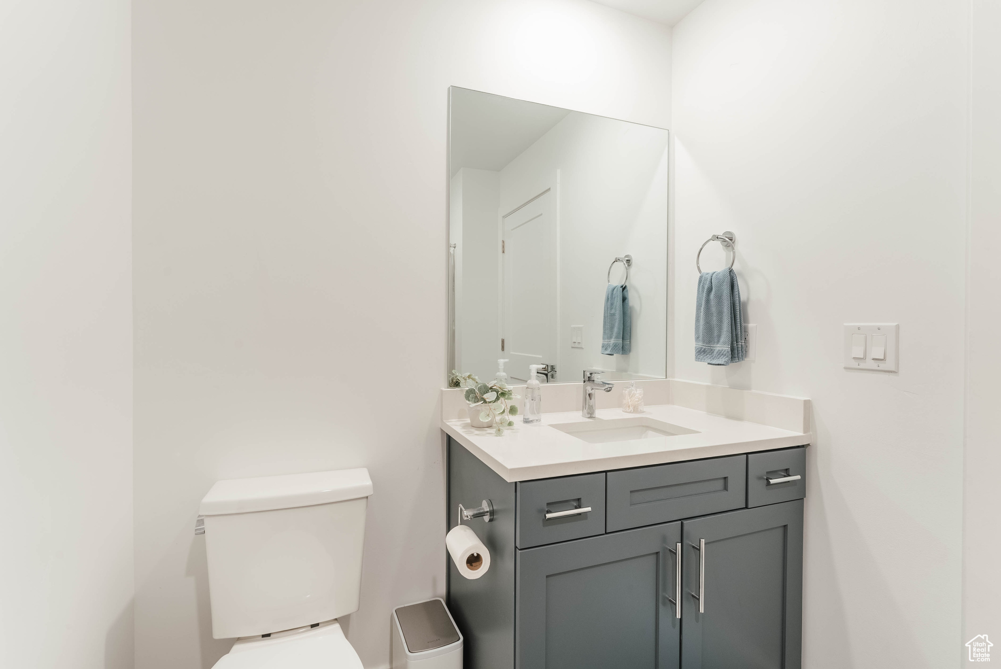 Bathroom with vanity and toilet