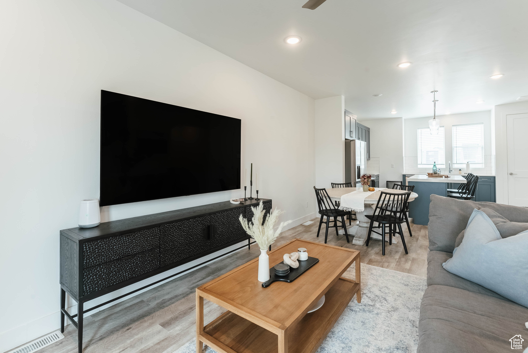 Living room with hardwood / wood-style floors