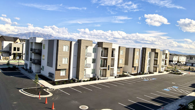 View of building exterior featuring a mountain view