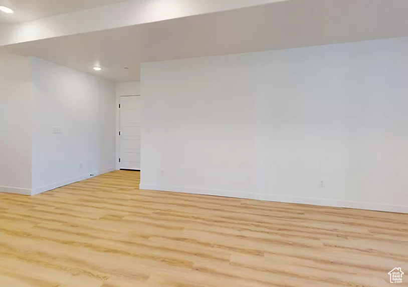 Empty room featuring light hardwood / wood-style floors