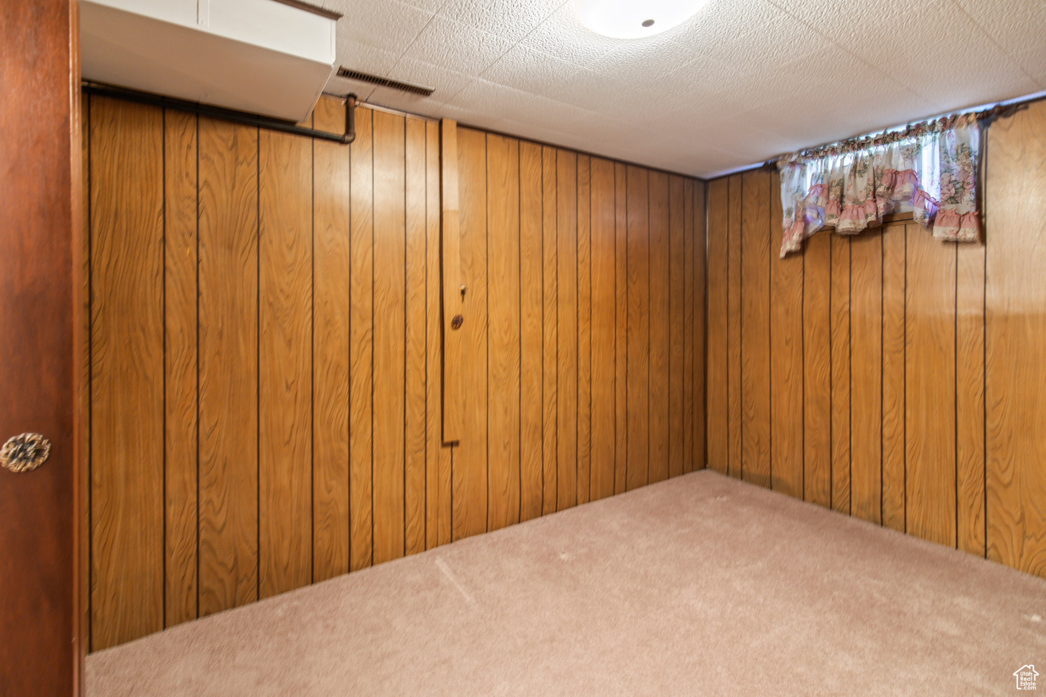 Basement with carpet