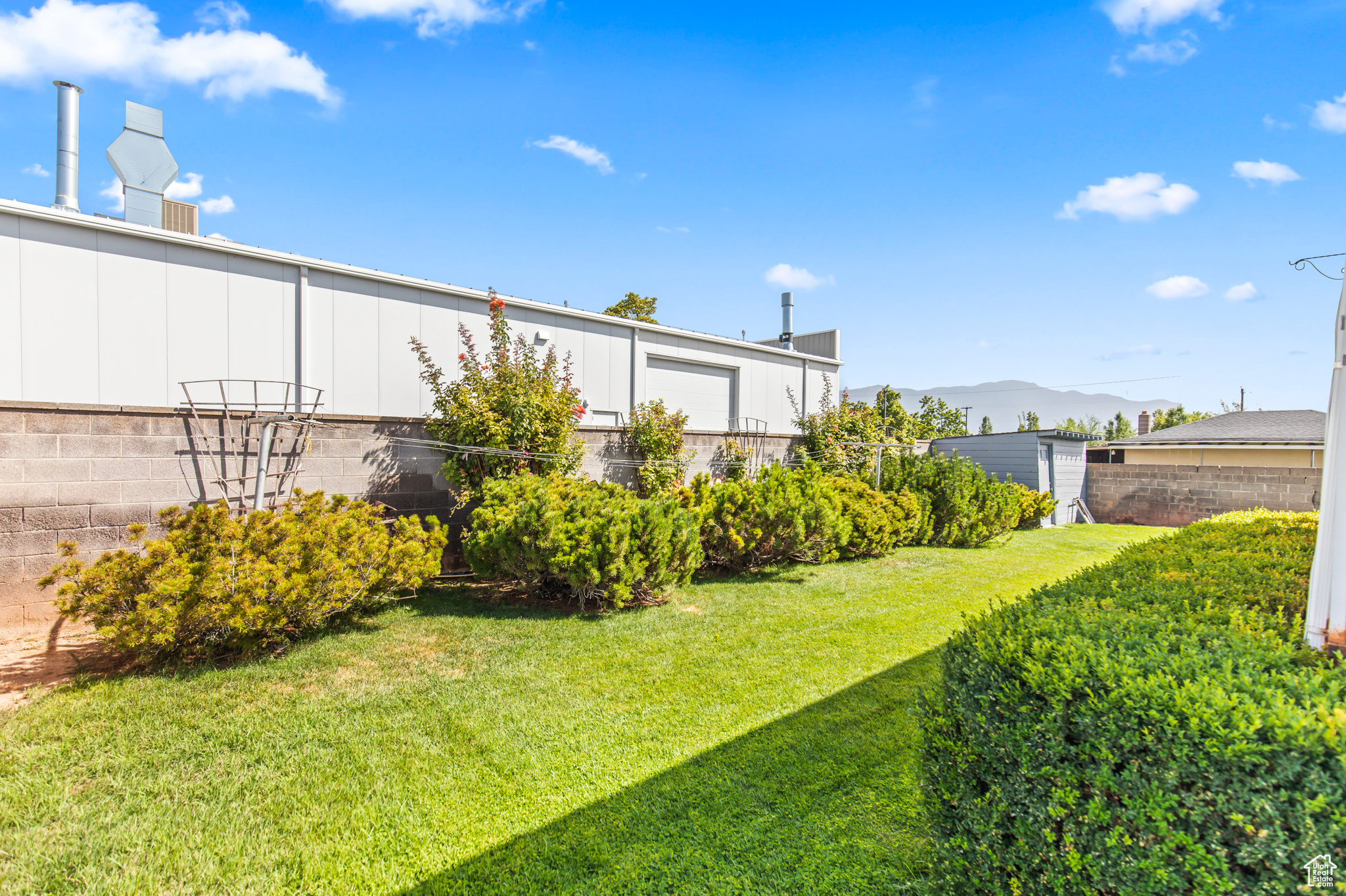 View of yard with a mountain view