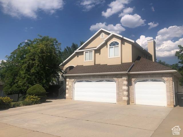 View of front facade with a garage