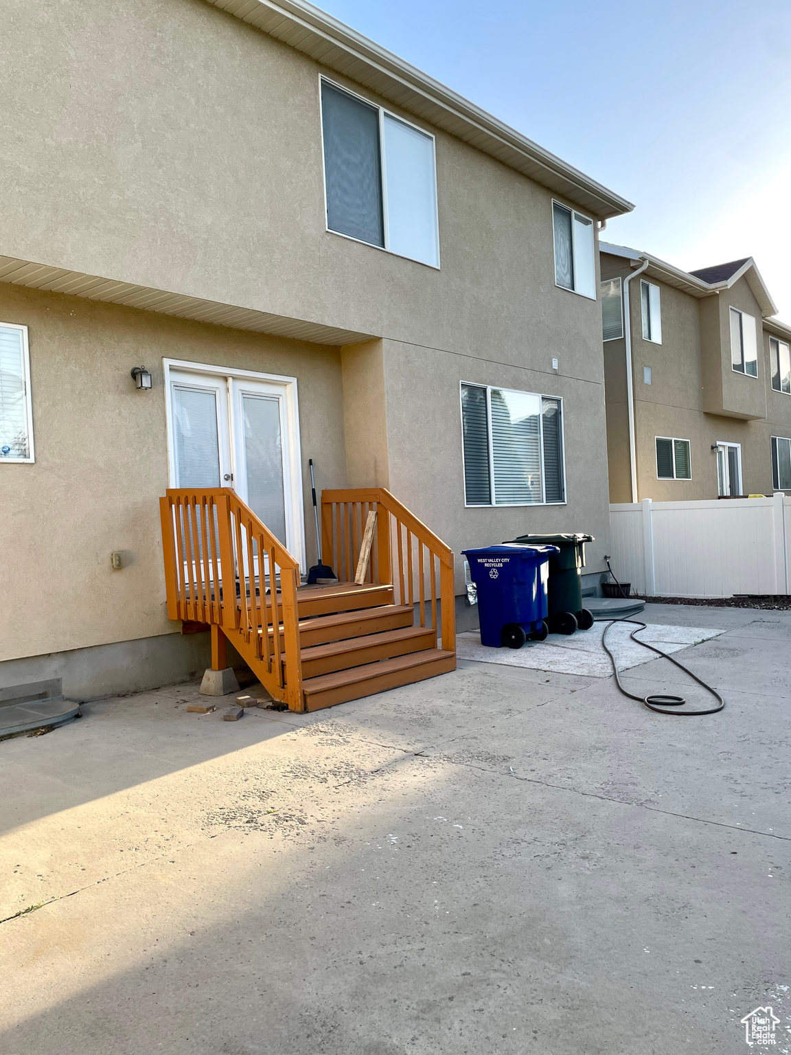 Rear view of property featuring a patio area