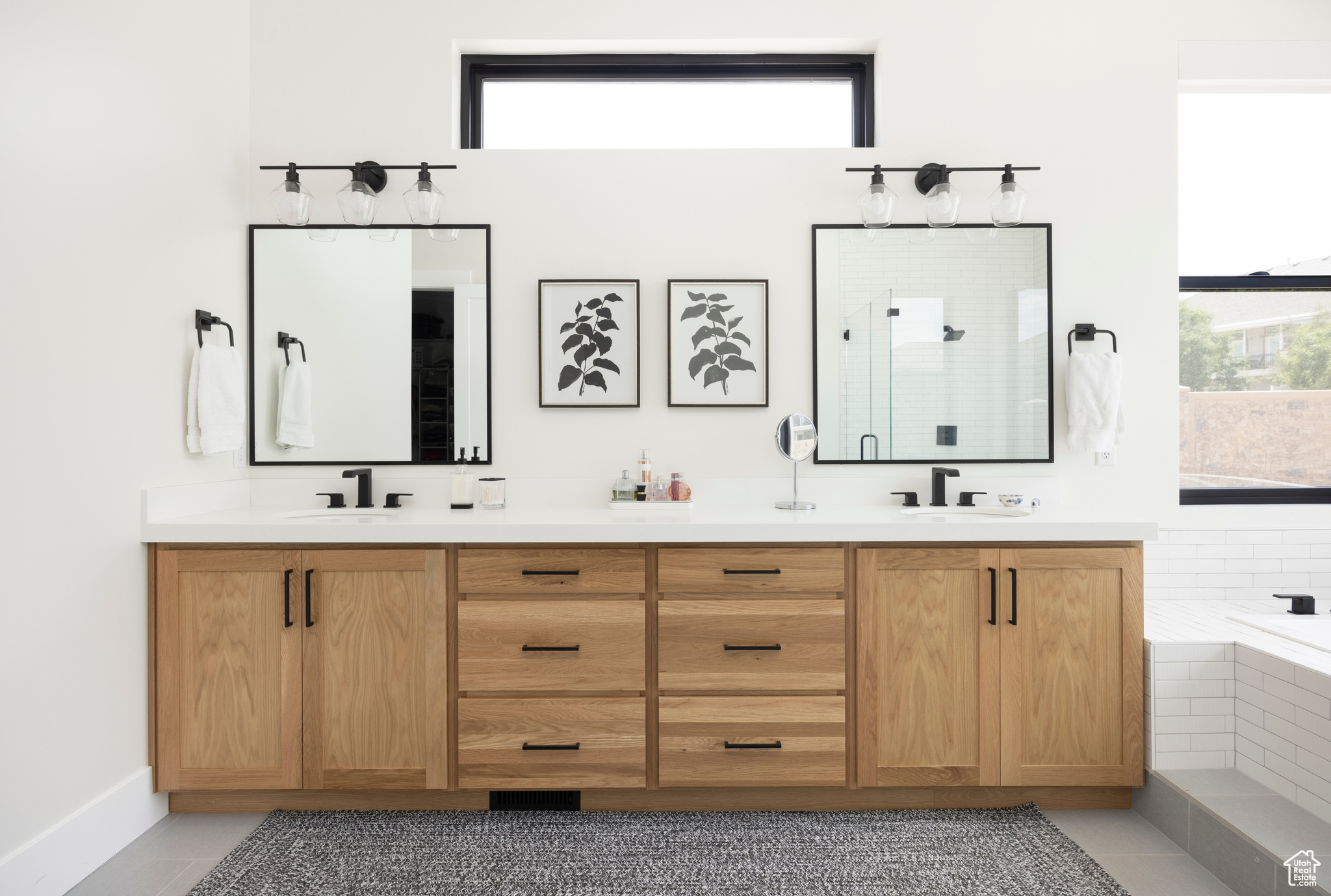 Bathroom featuring vanity, separate shower and tub, and tile patterned floors