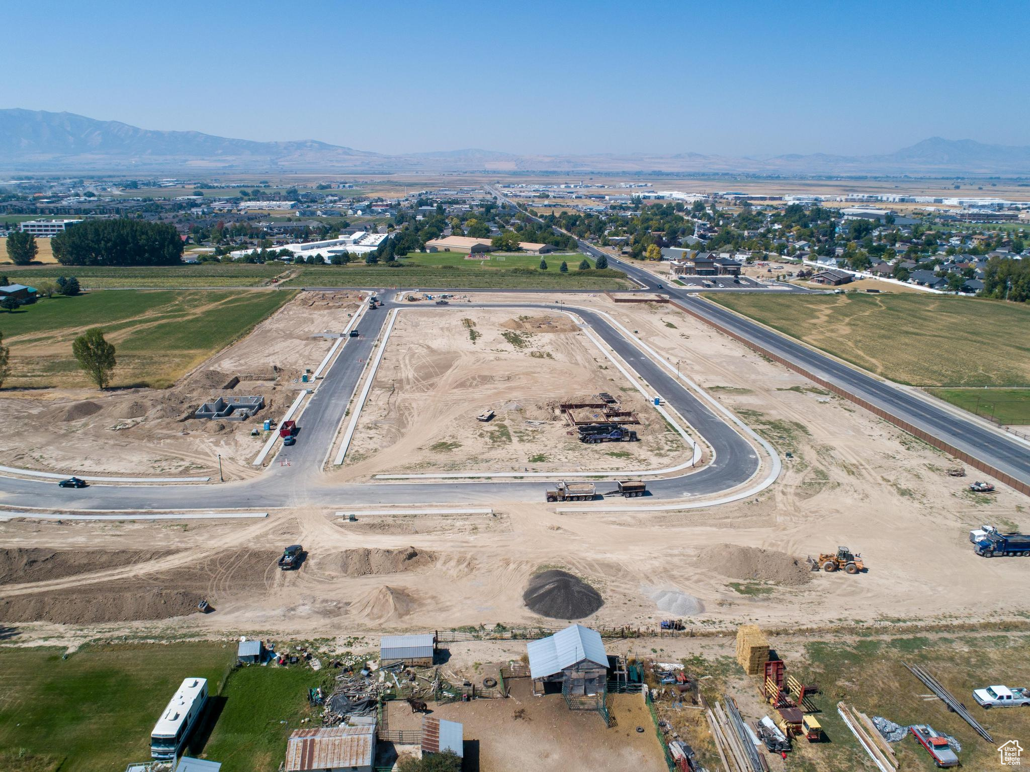 Drone / aerial view with a mountain view and a rural view