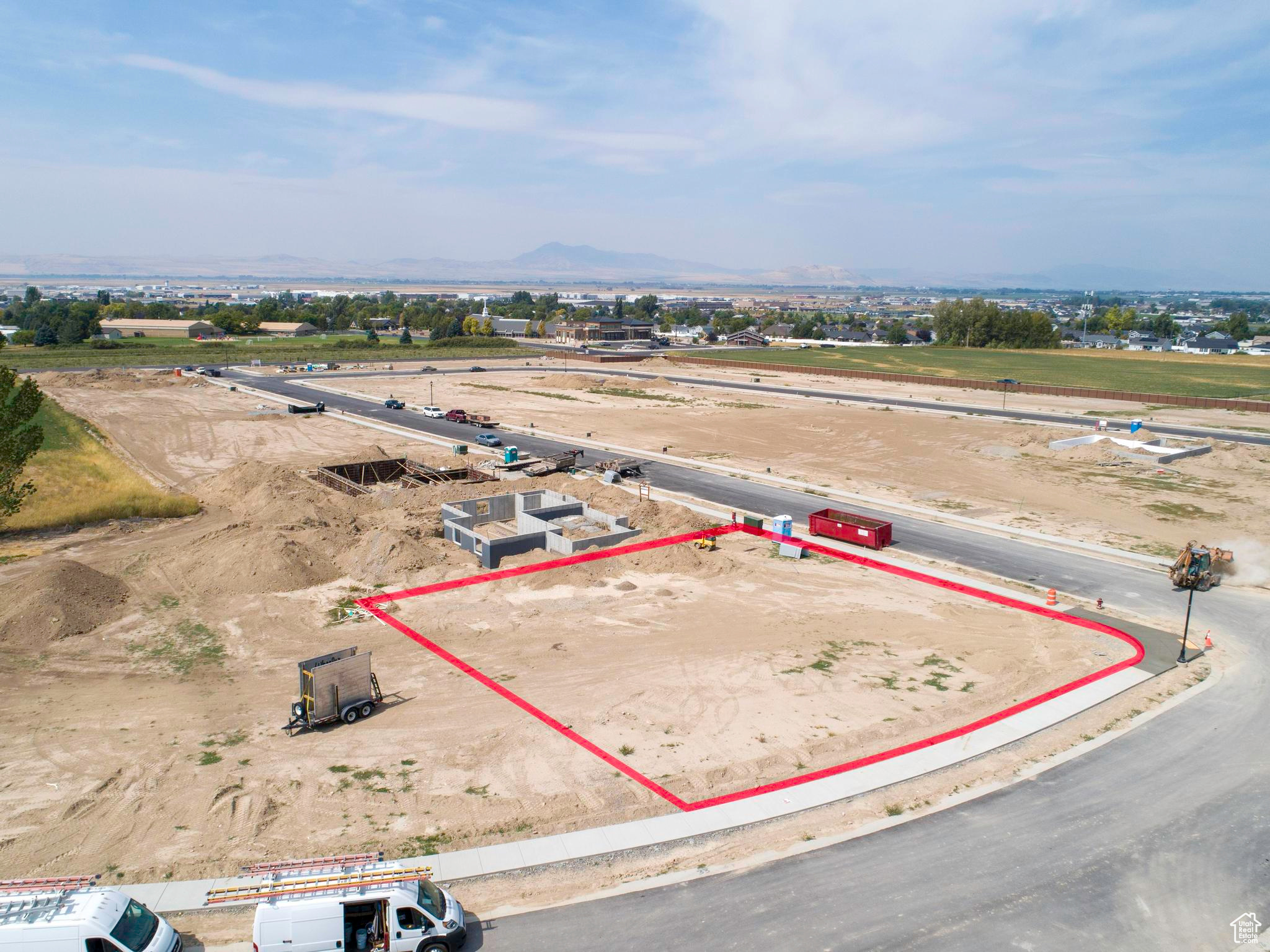 Birds eye view of property with a mountain view