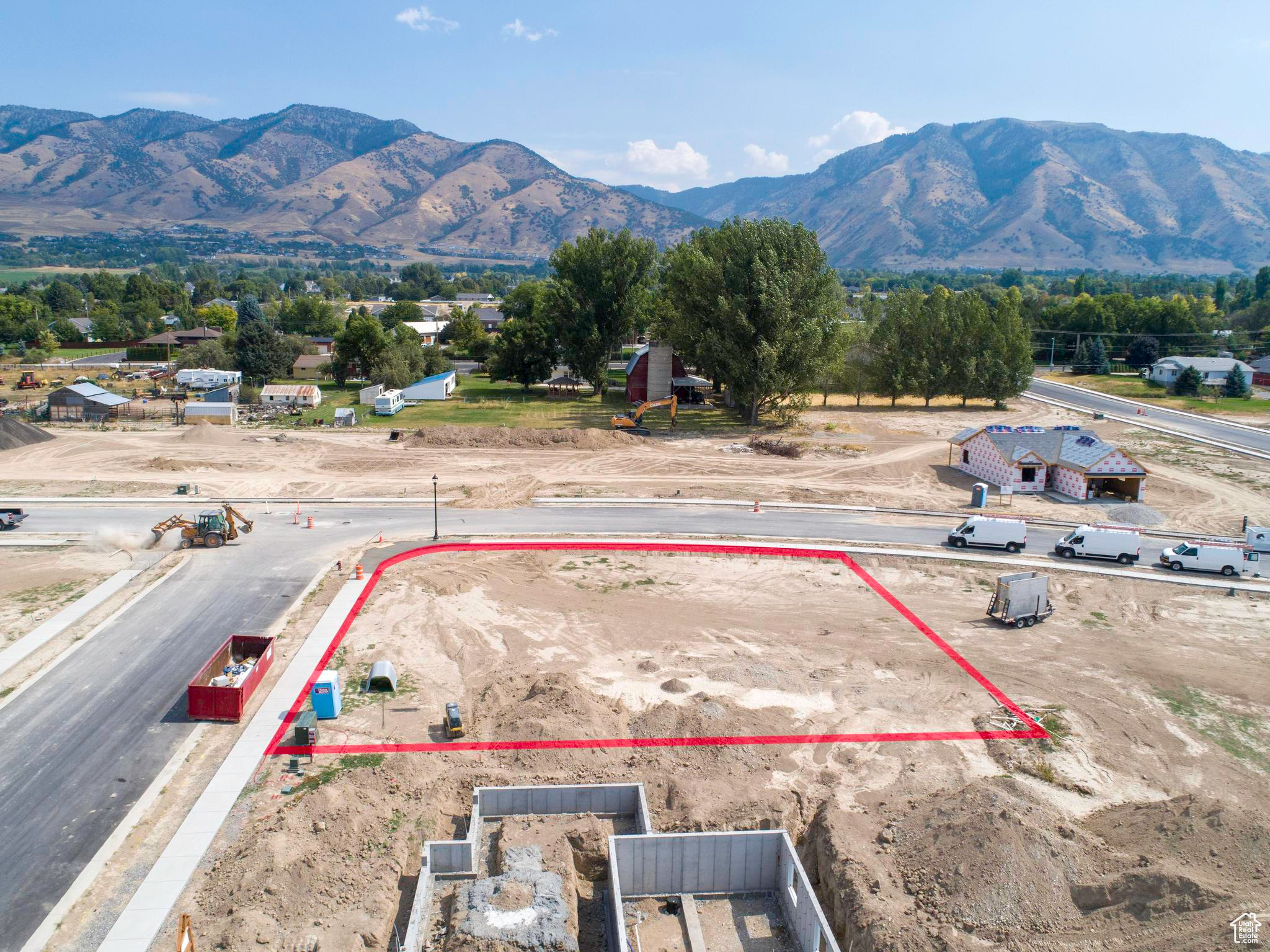 Birds eye view of property with a mountain view