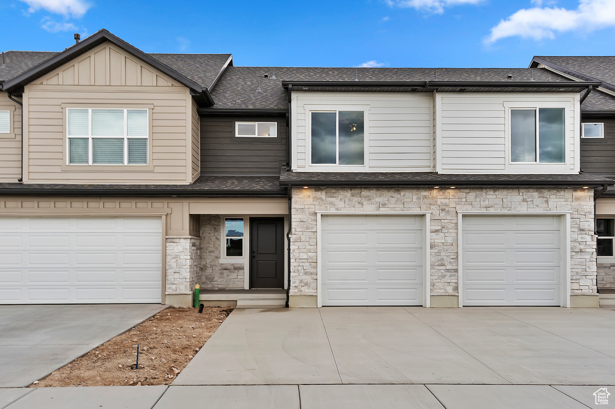 View of property with a garage