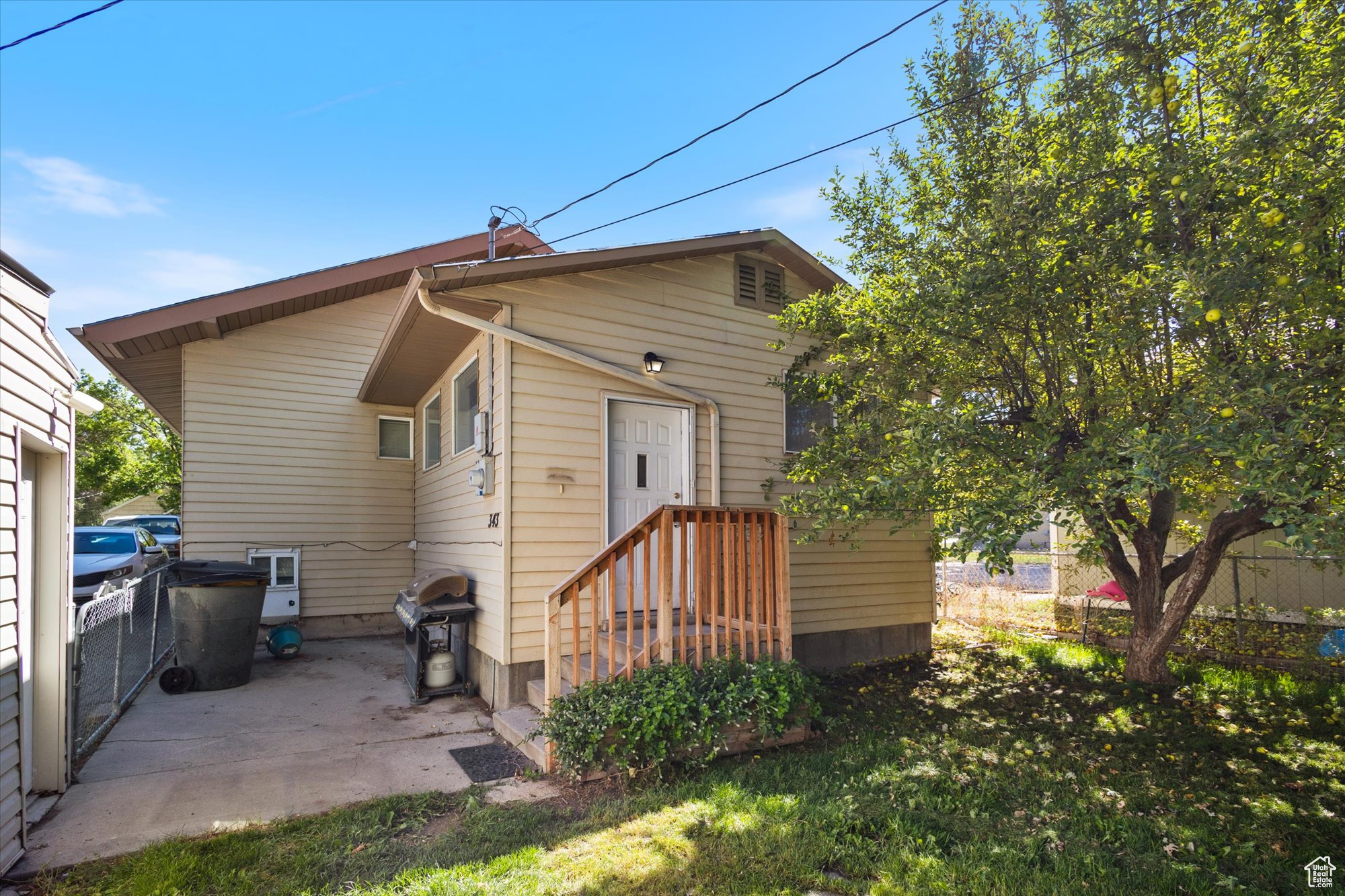 Rear view of house featuring a patio area