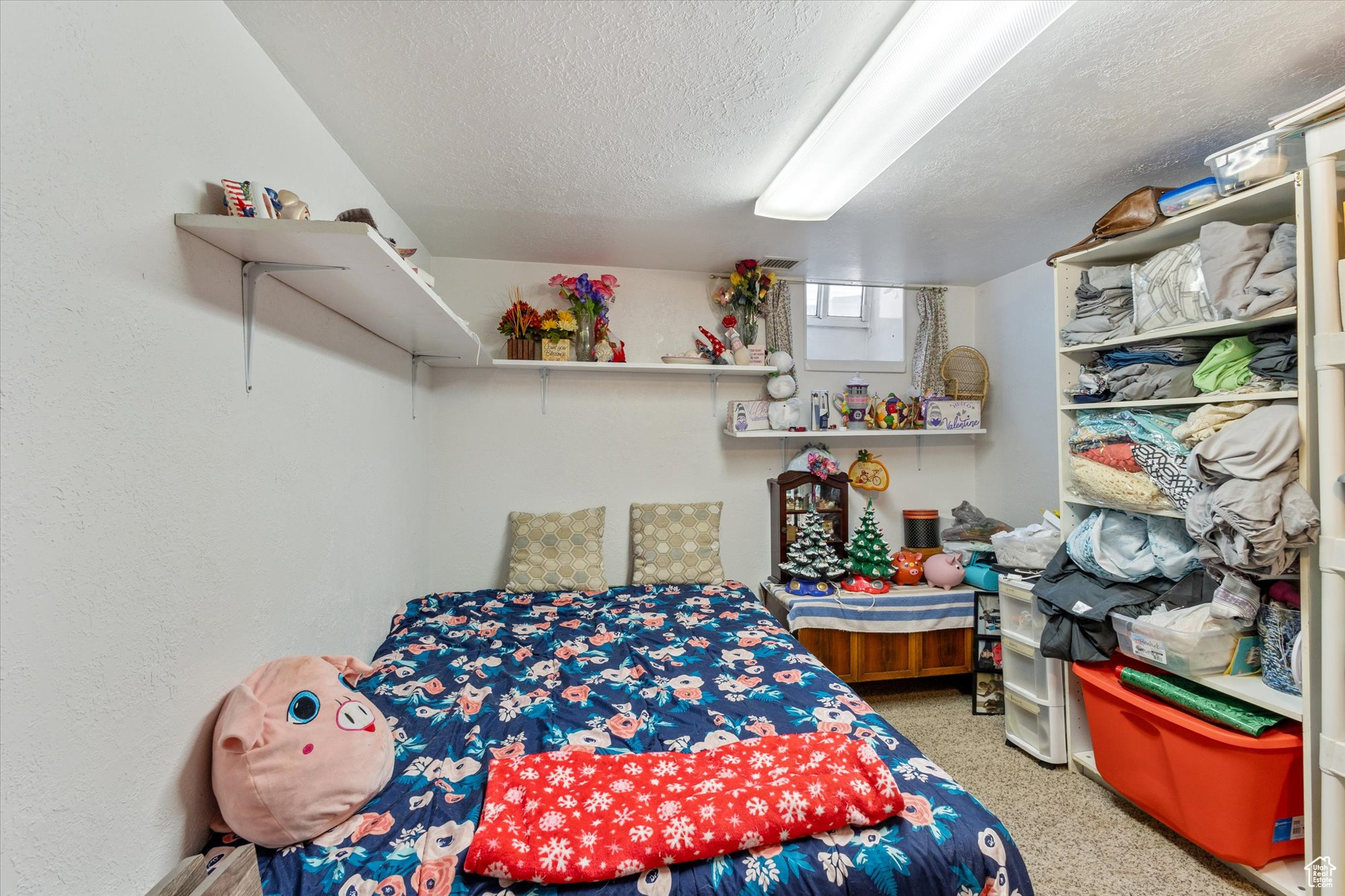 Bedroom featuring a textured ceiling