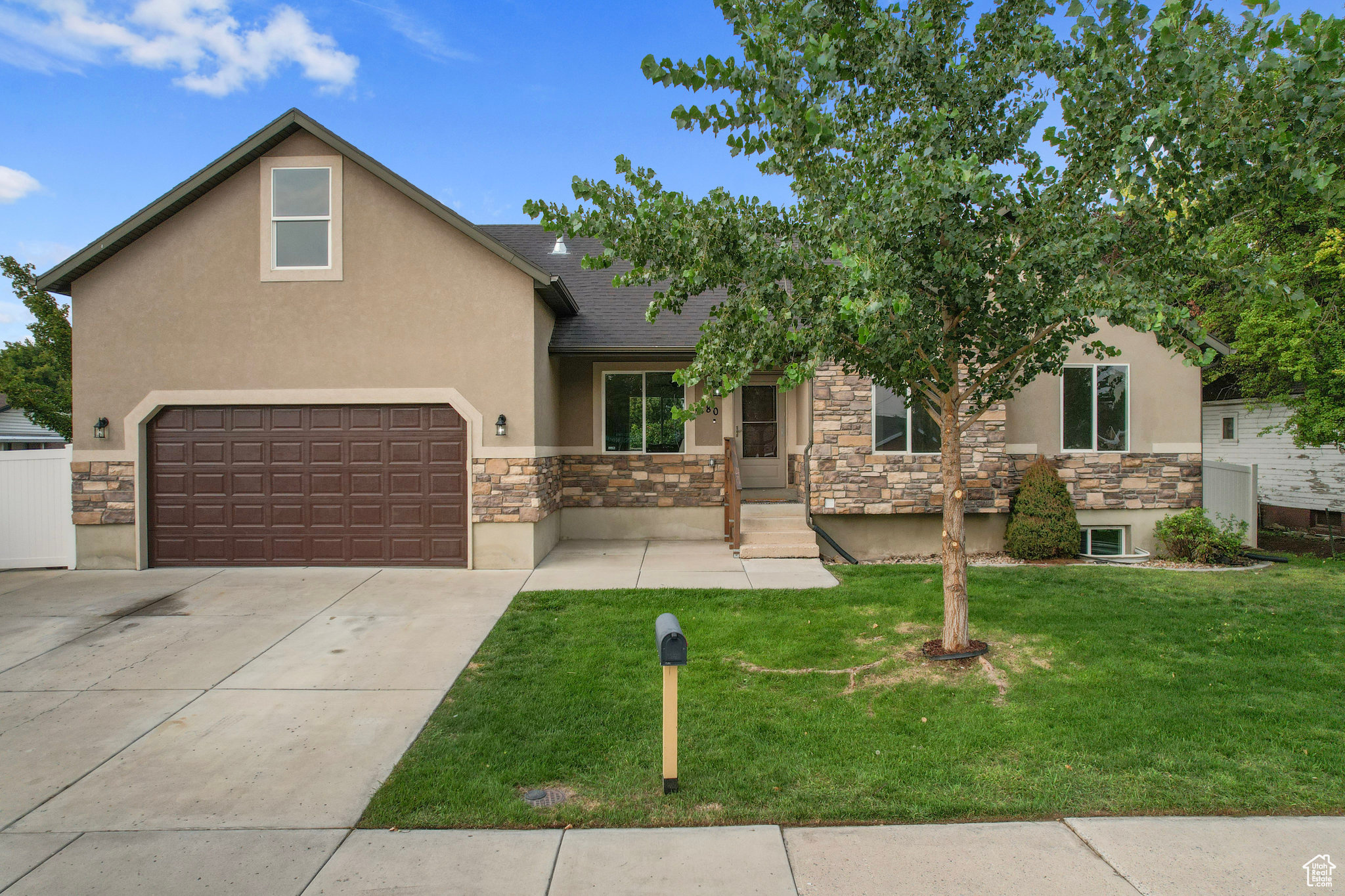 View of front of house with a front yard