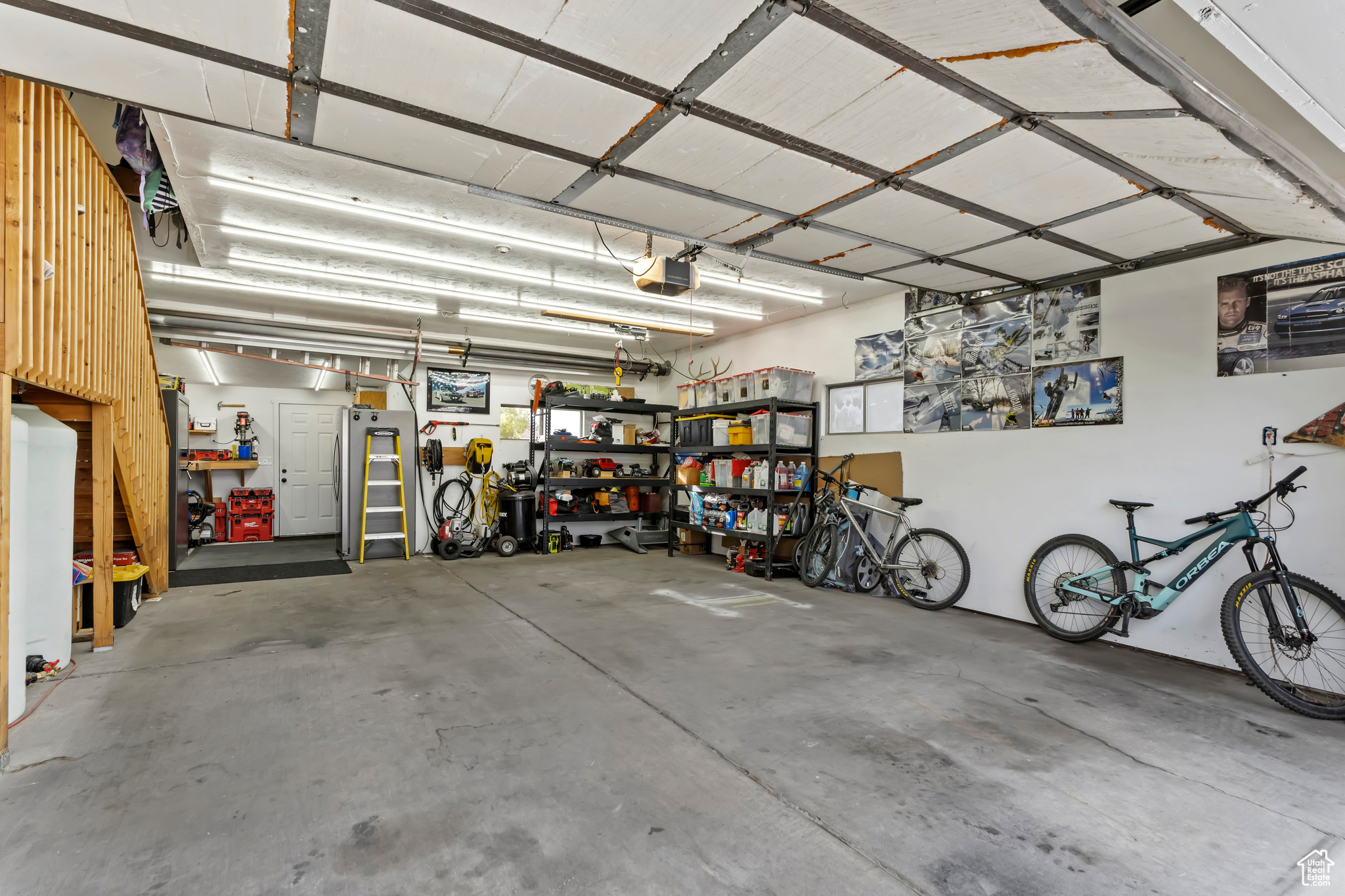 Garage featuring a garage door opener