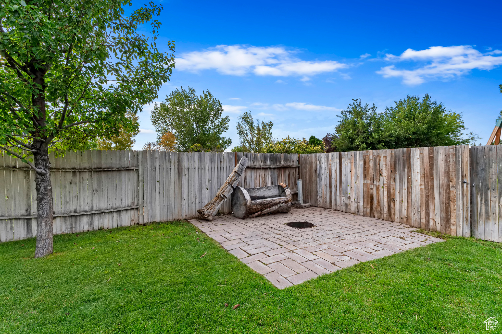 View of yard with a patio area