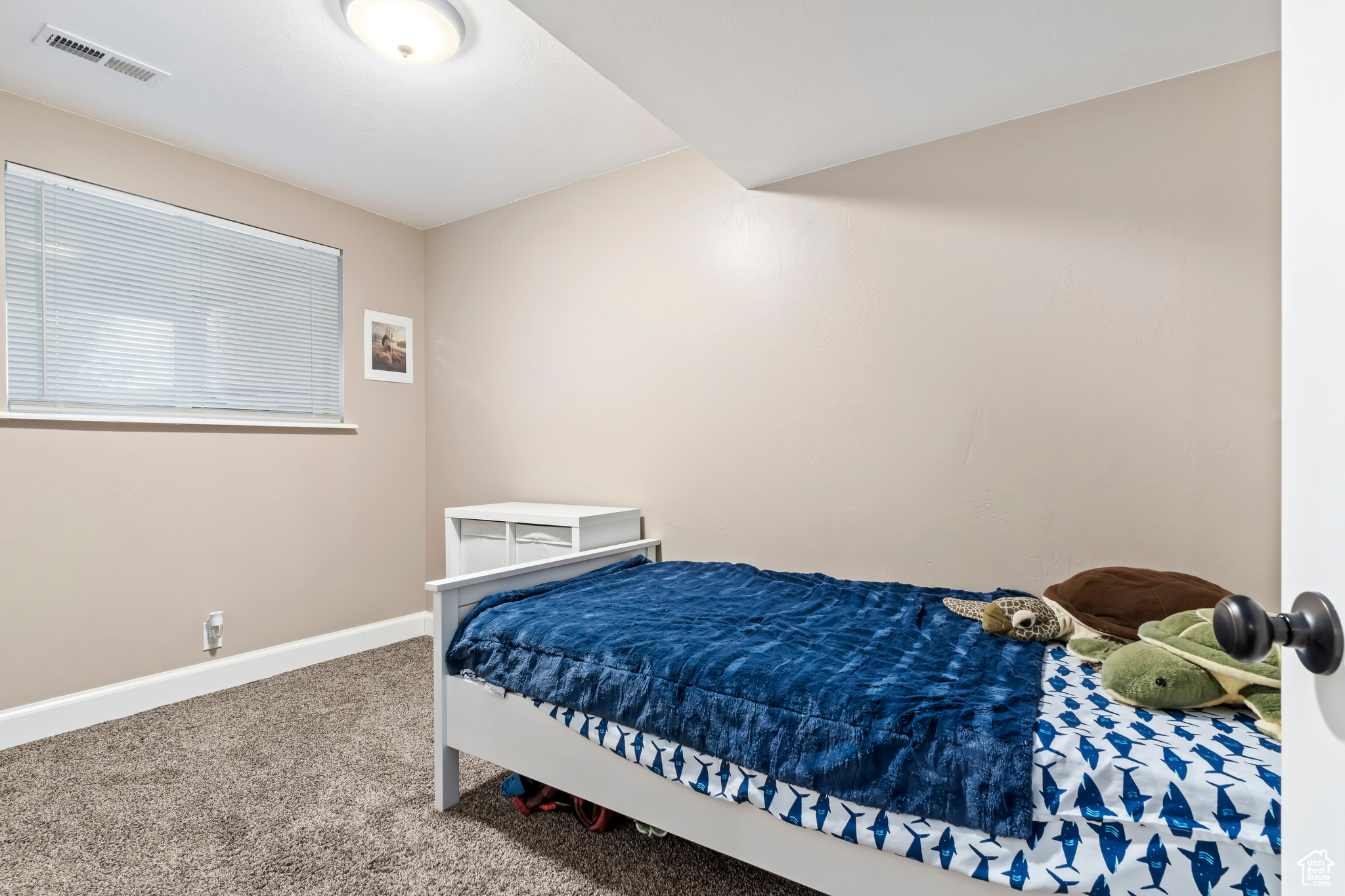 Bedroom featuring carpet floors