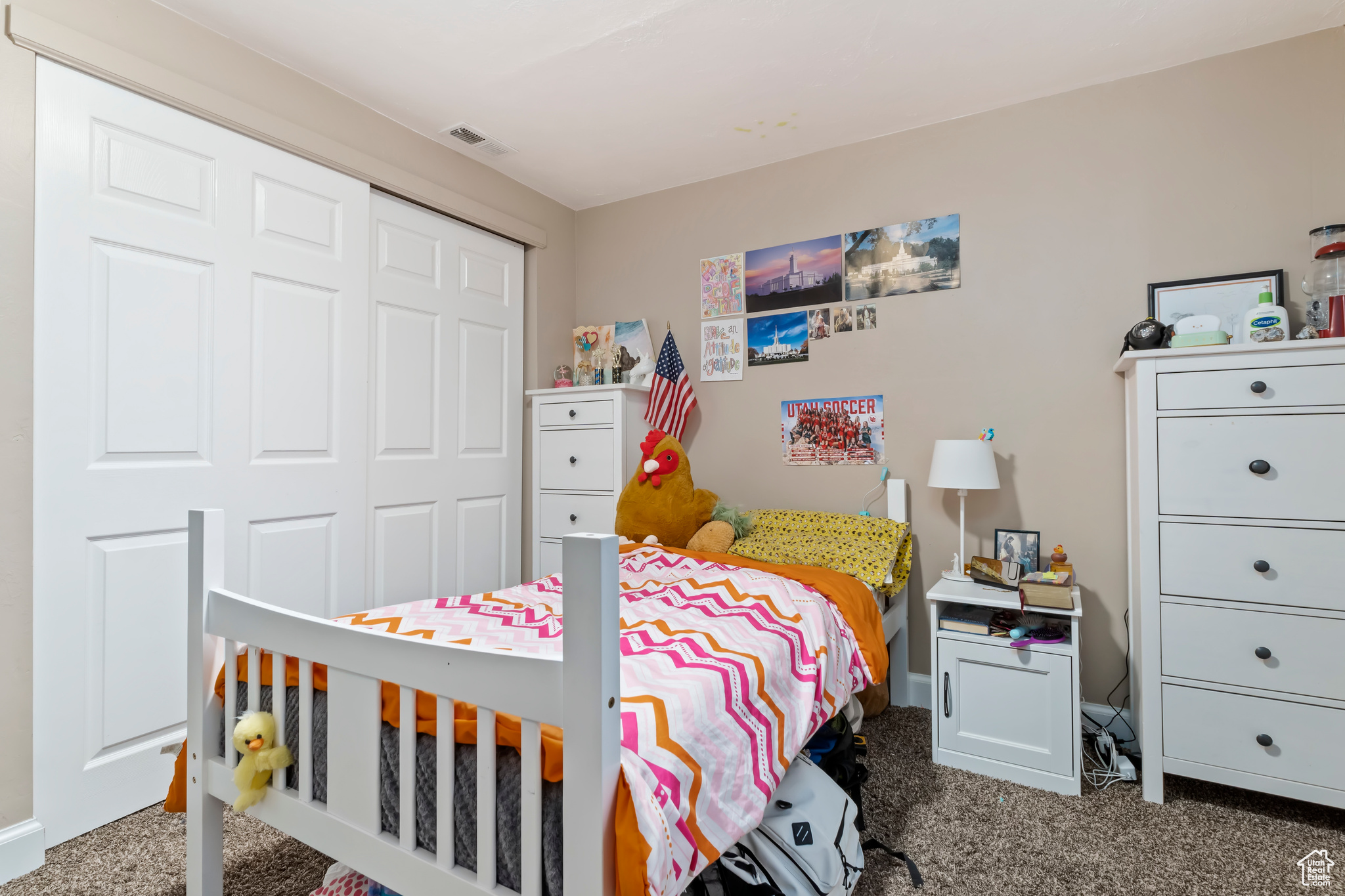 Bedroom with carpet flooring and a closet