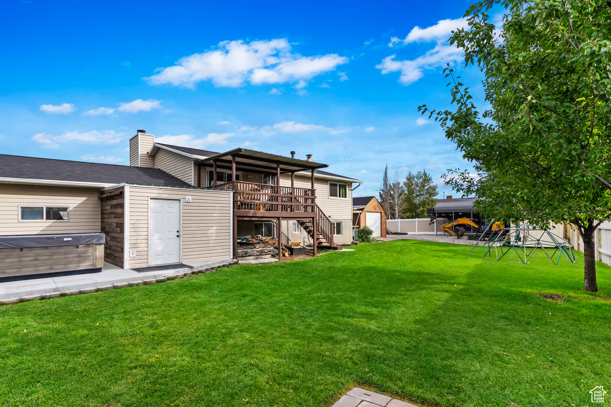 View of yard with a deck