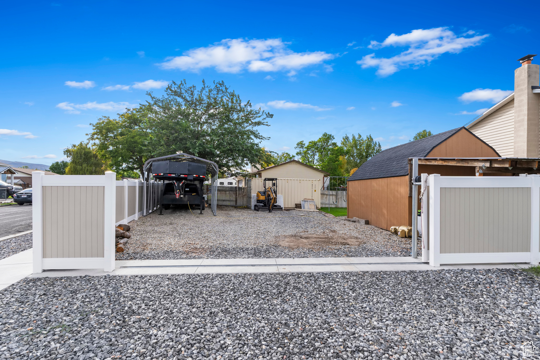 View of yard with a storage shed