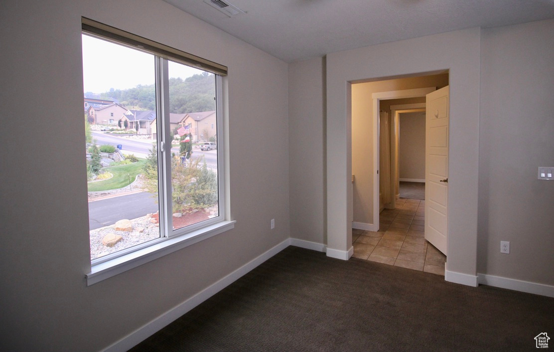 One of four bedrooms located upstairs on the second level.