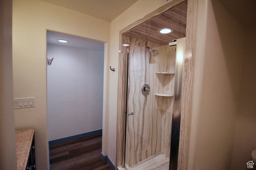 Interior space with dark hardwood / wood-style flooring