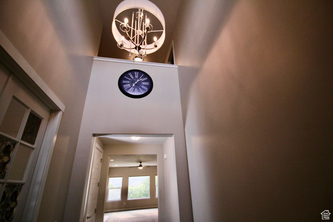 Room details featuring an inviting chandelier