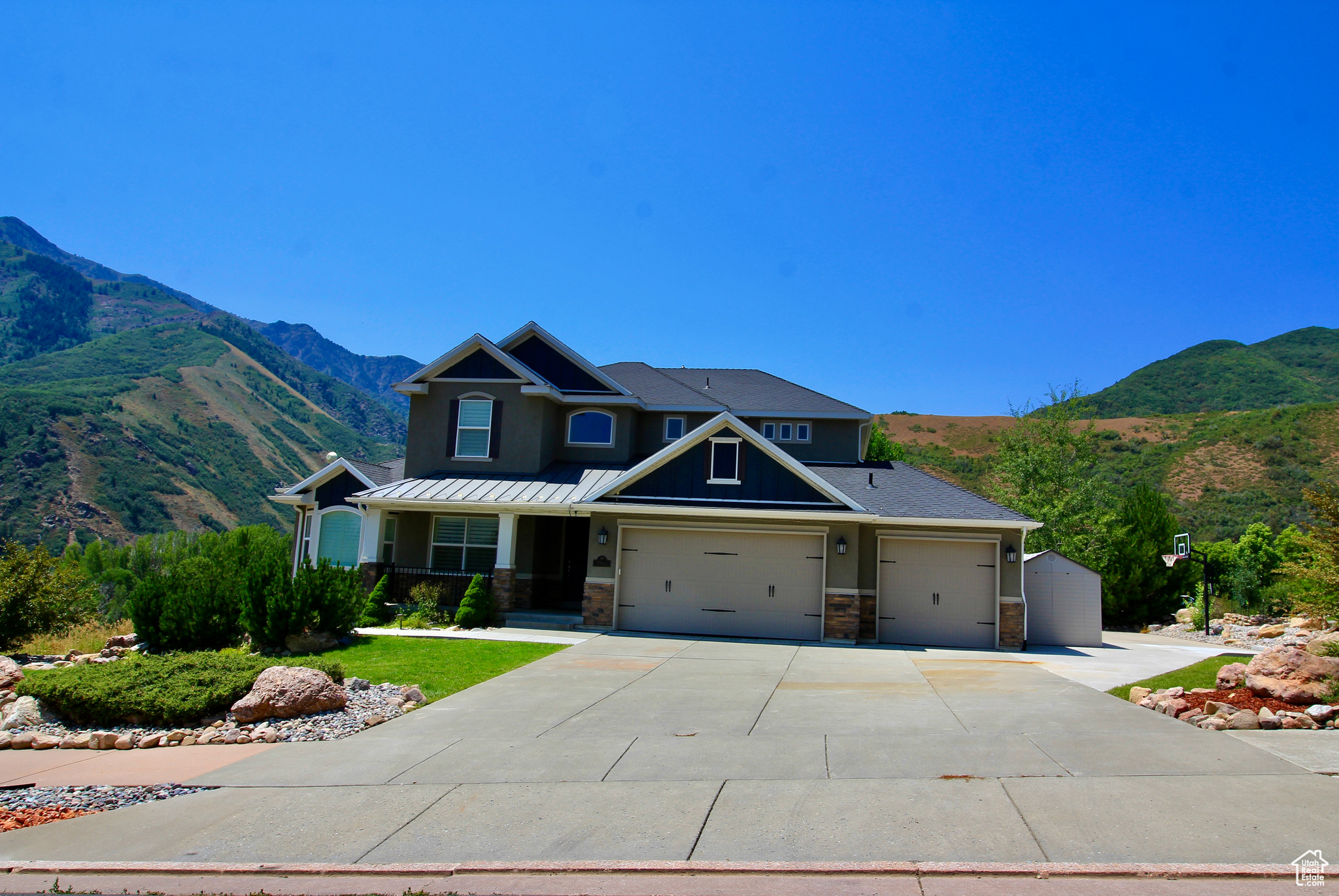 Craftsman-style home featuring a mountain view and a garage