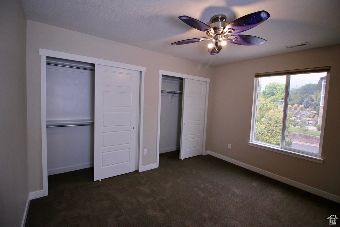 One of four bedrooms located upstairs on the second level.