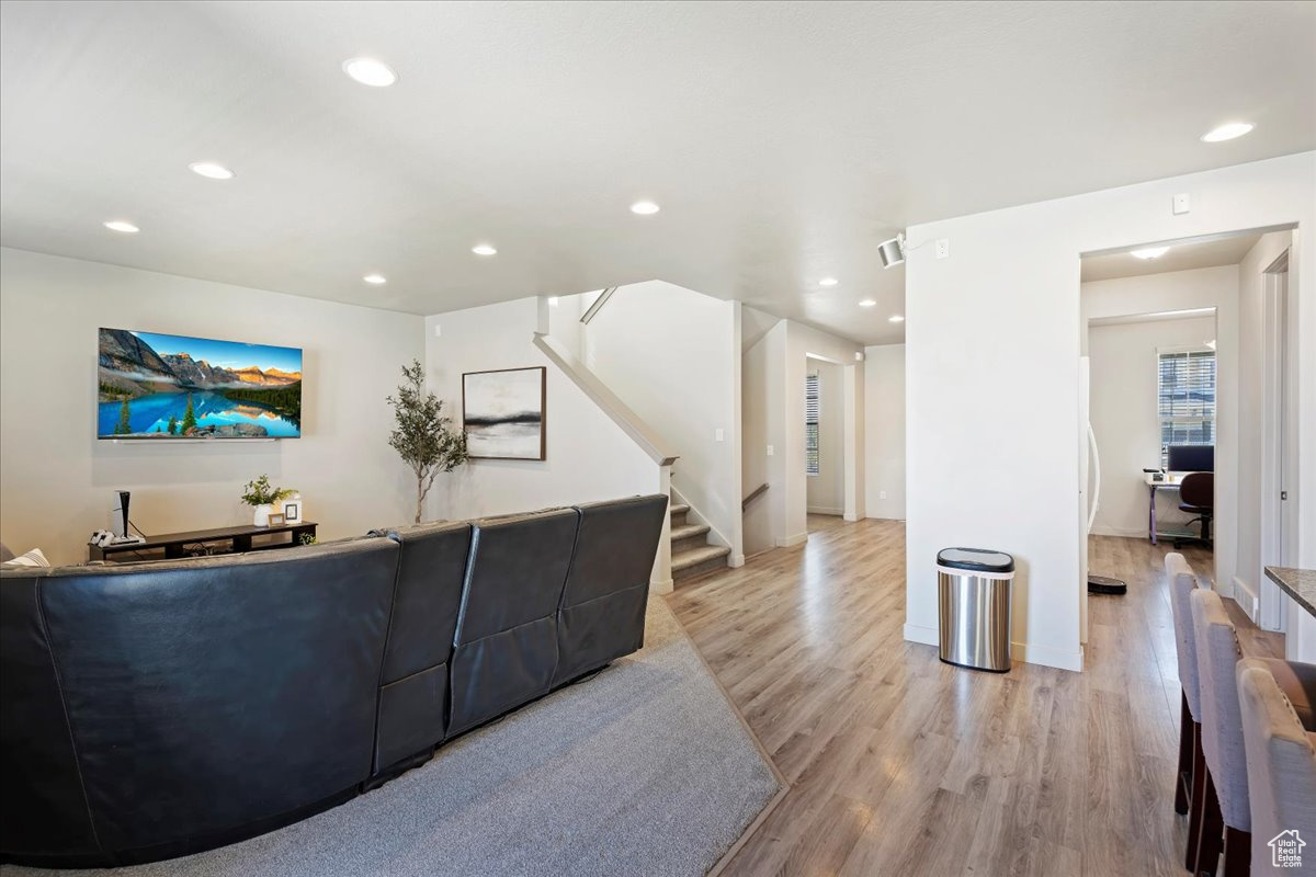 Separate hallway from kitchen to pantry and living room/formal dining area.