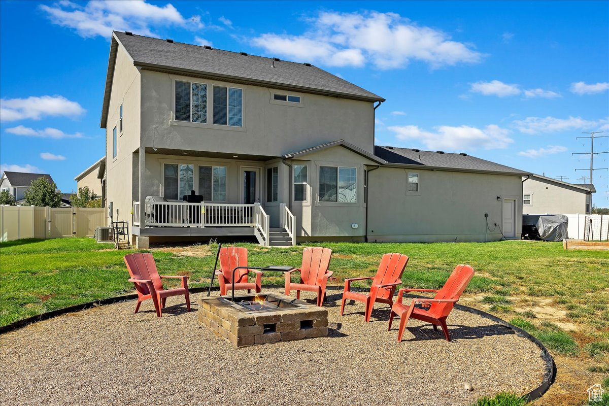 HUGE backyard with horseshoe pits, fire pit, and garden