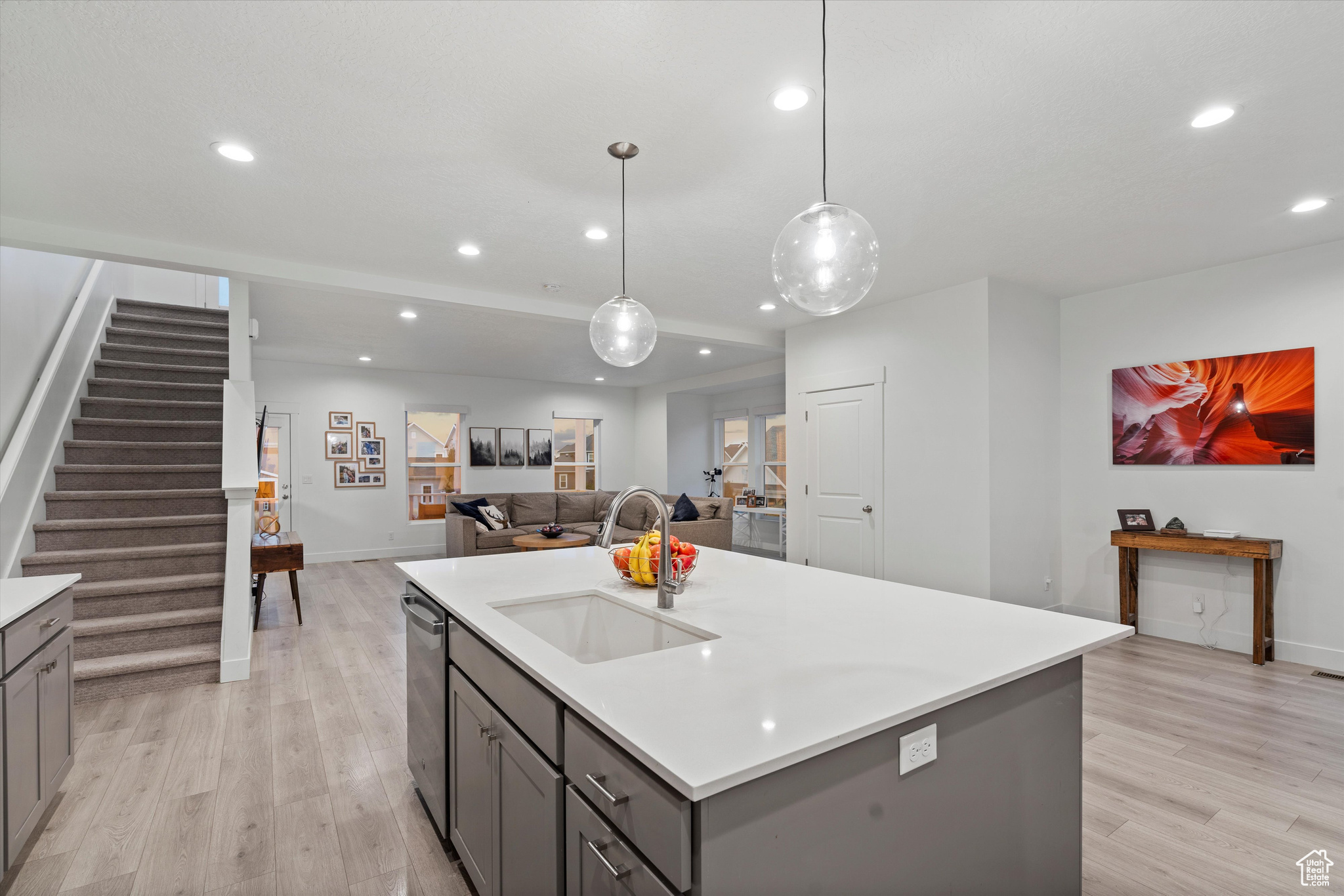 Looking from pantry and 1/2 bath area toward 3rd floor staircase