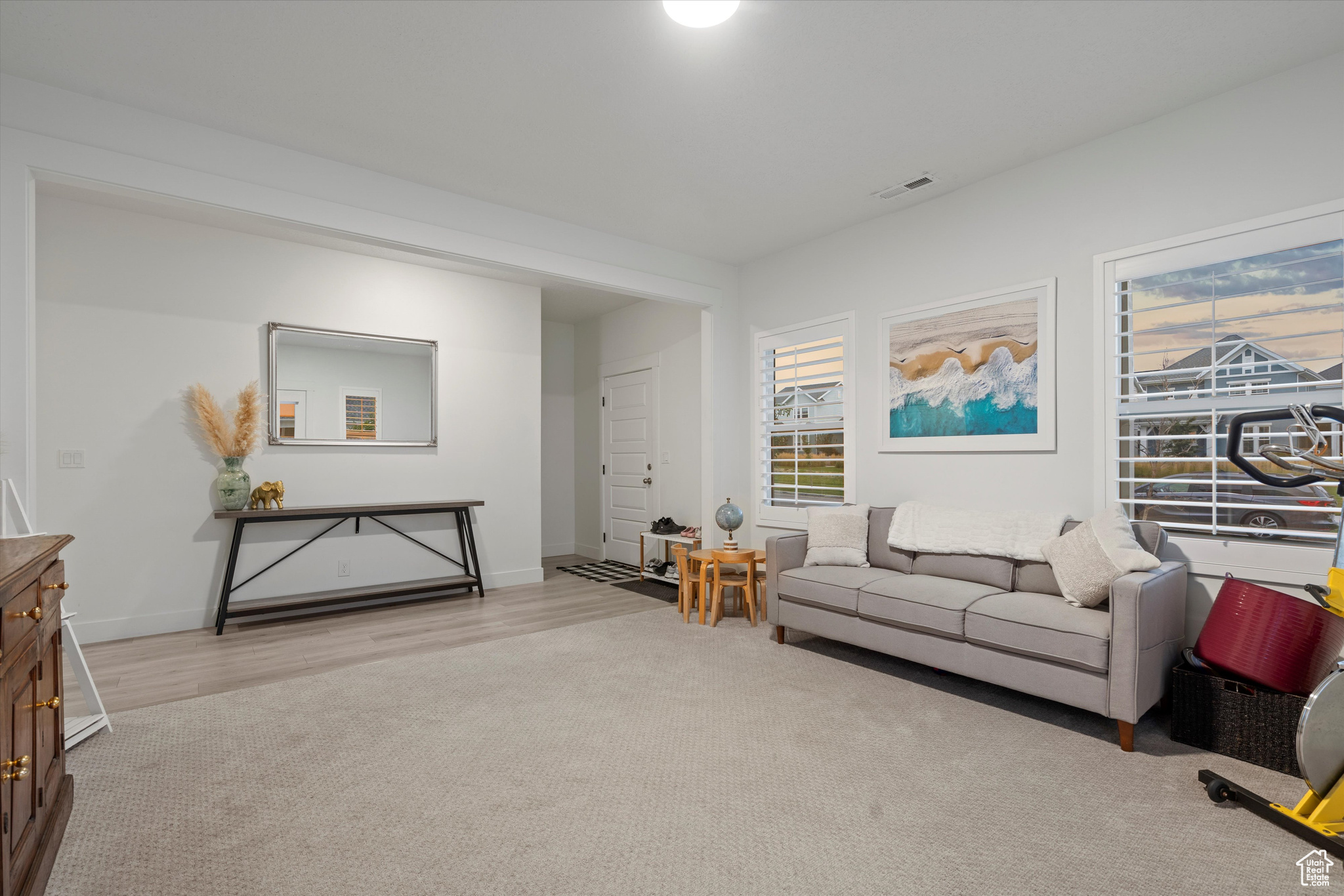 Front door entrance Living room featuring light hardwood / wood-style floors