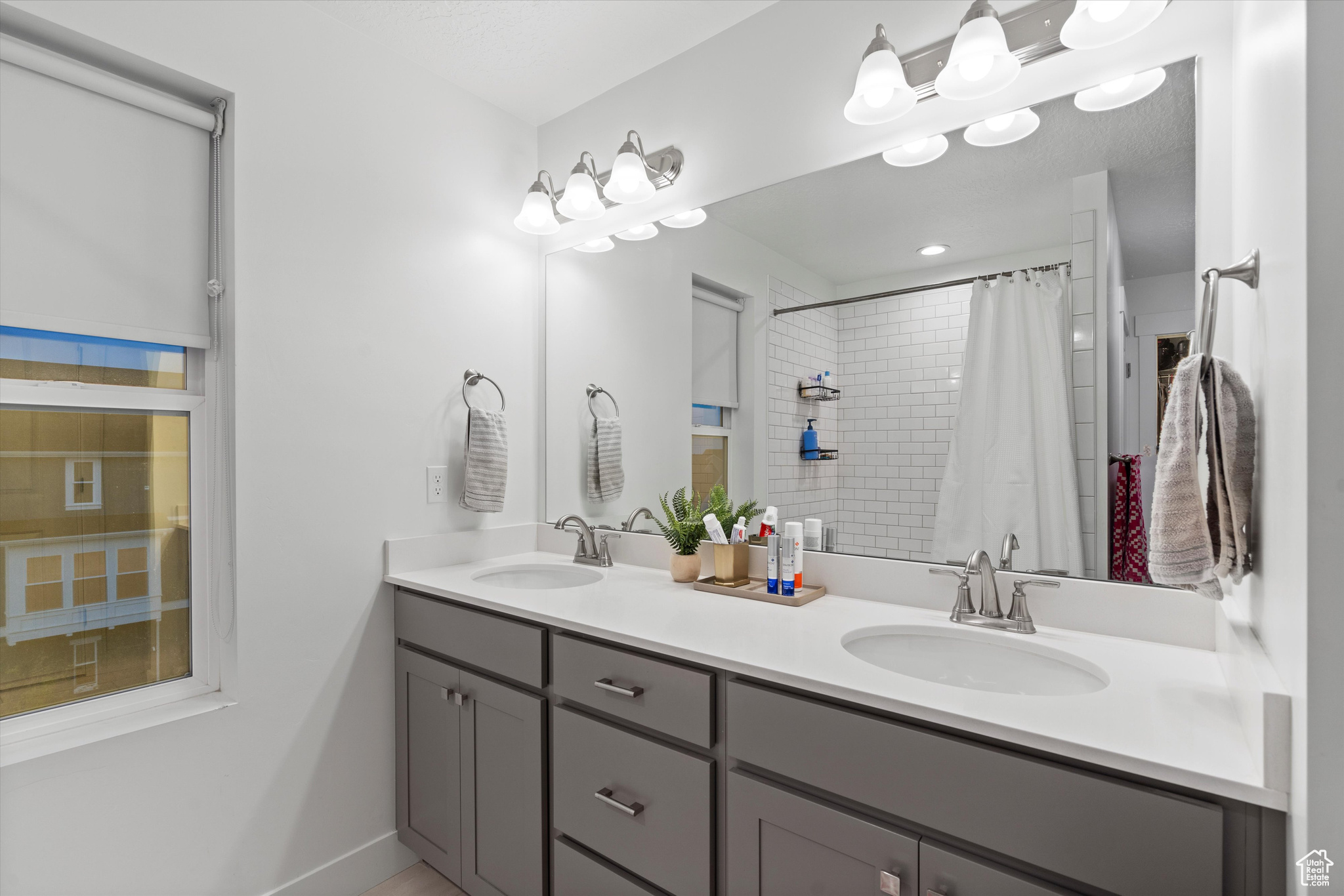 Master bathroom showing double sinks