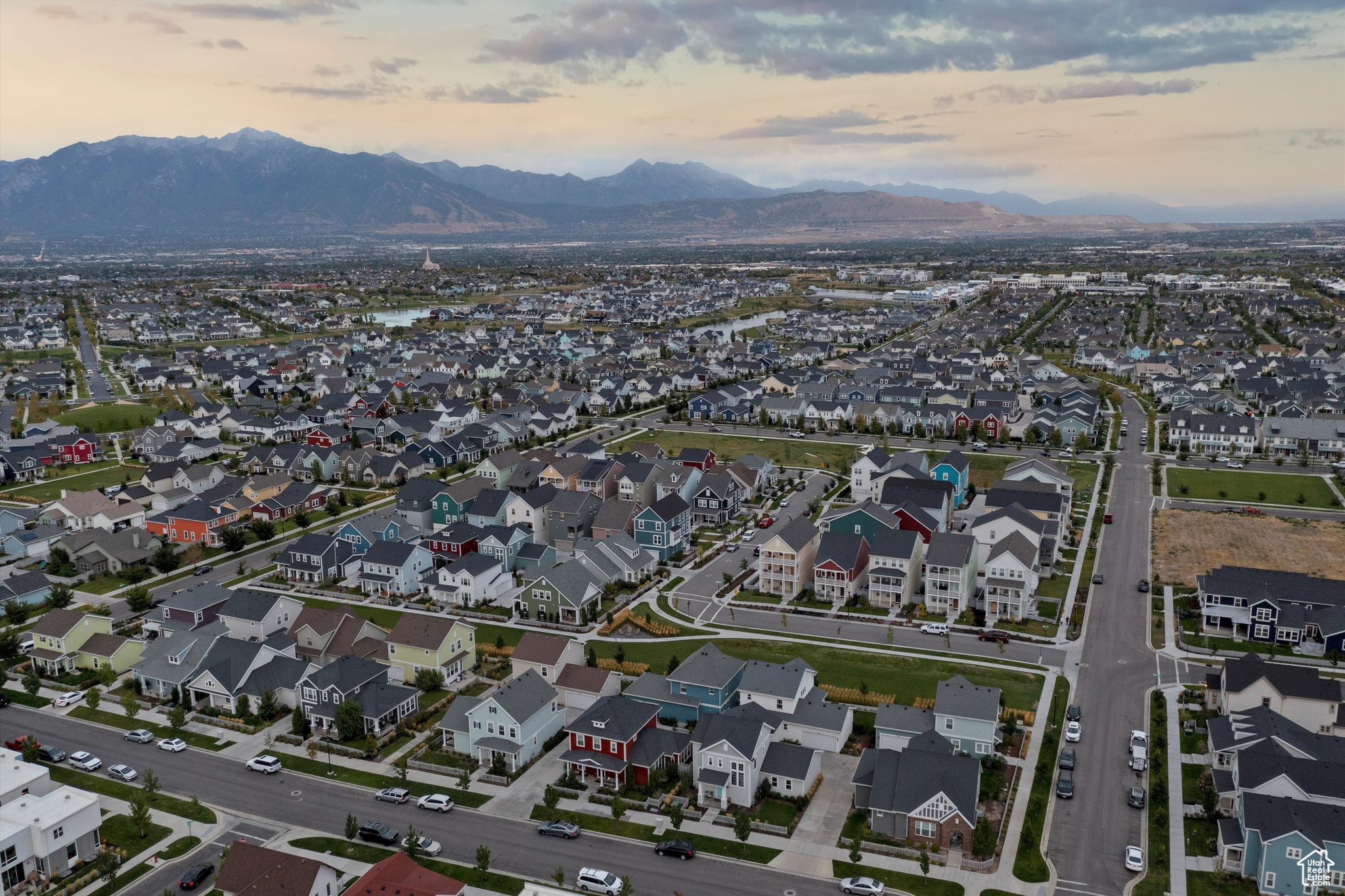 Aerial view at dusk featuring a mountain view