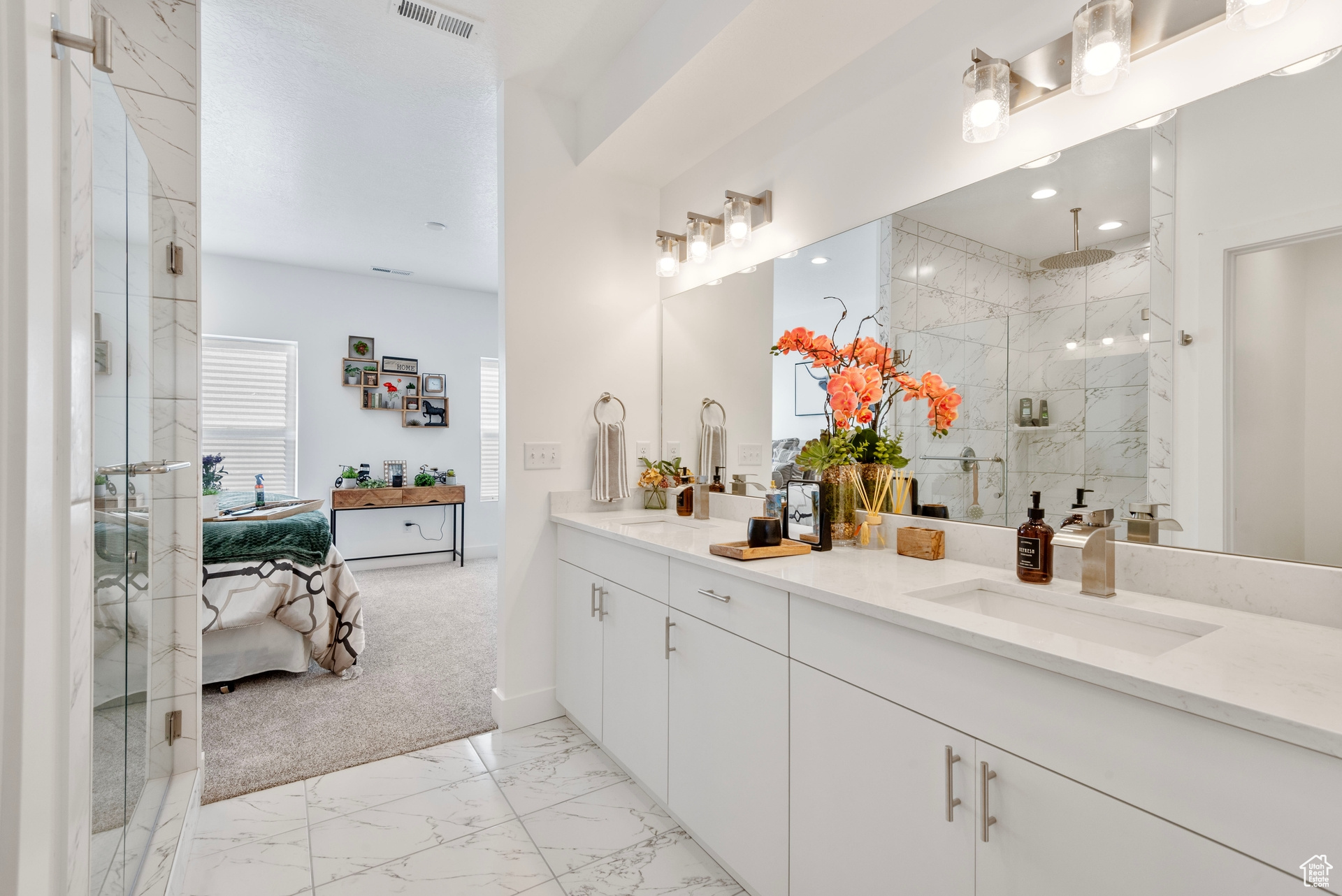 Bathroom with walk in shower and vanity