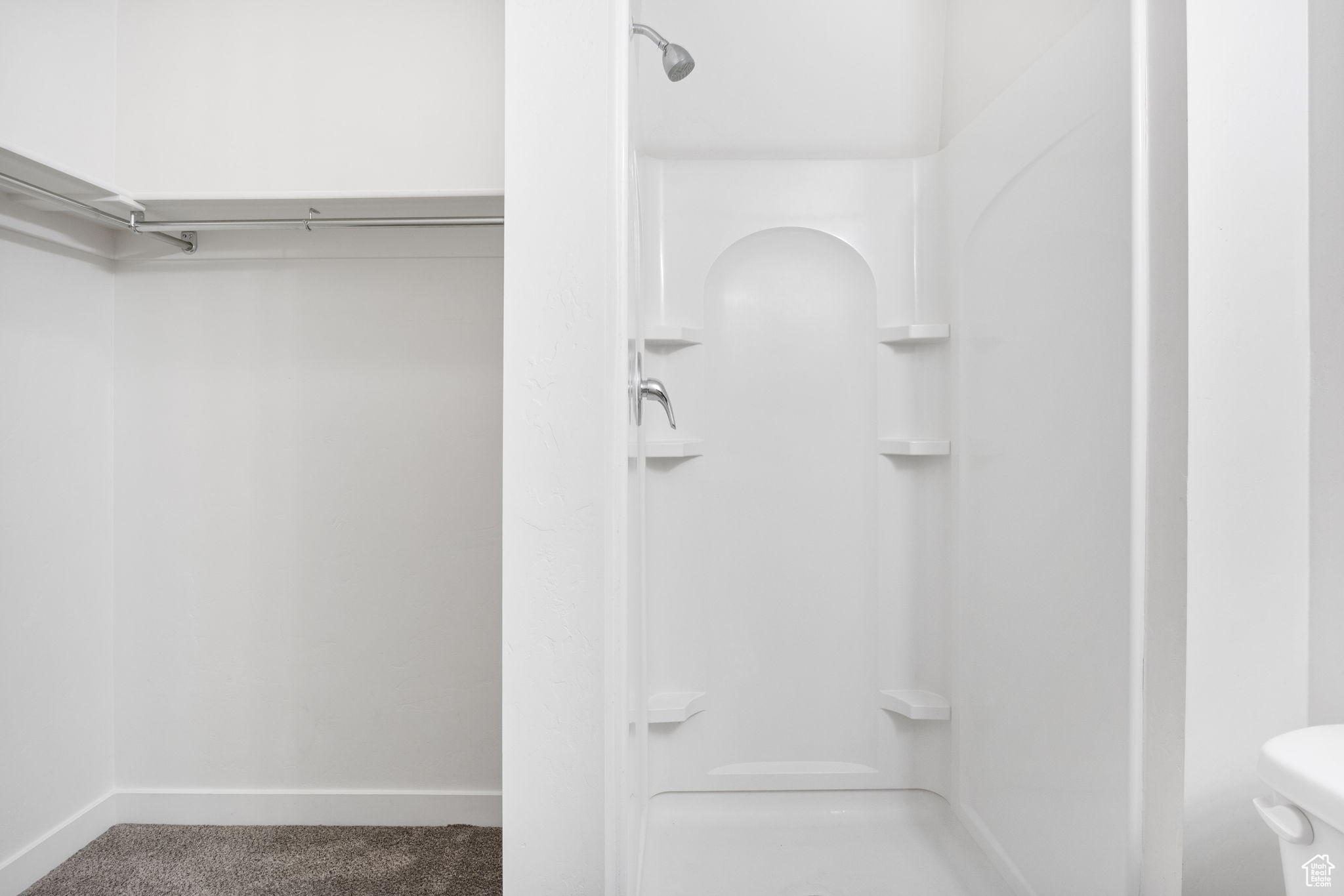 Bathroom with a shower and toilet