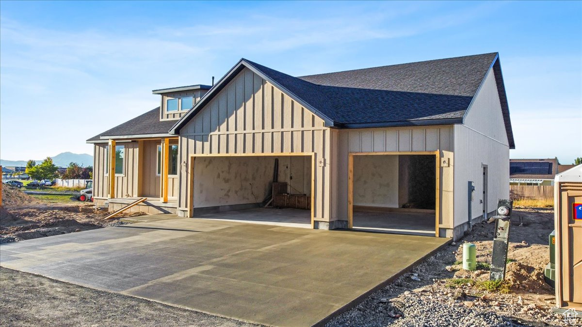 View of front of property with a mountain view