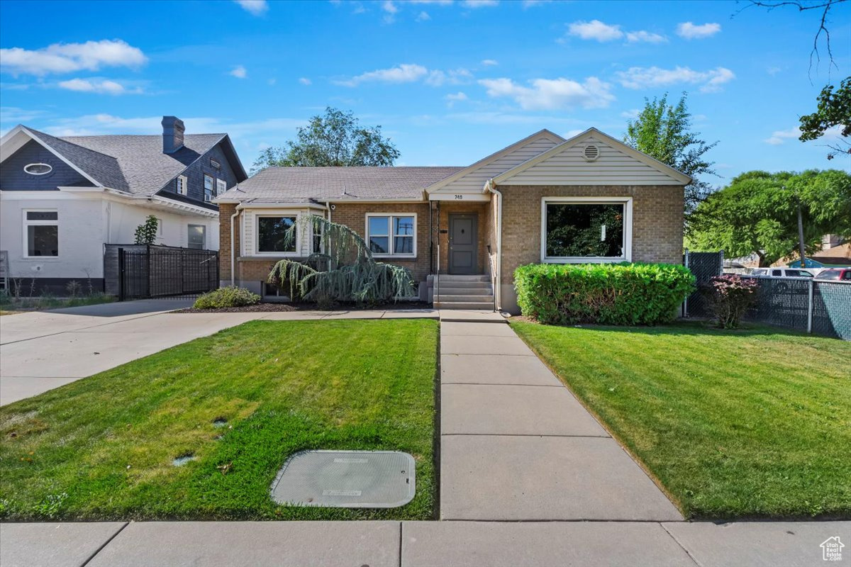 View of front of home with a front lawn