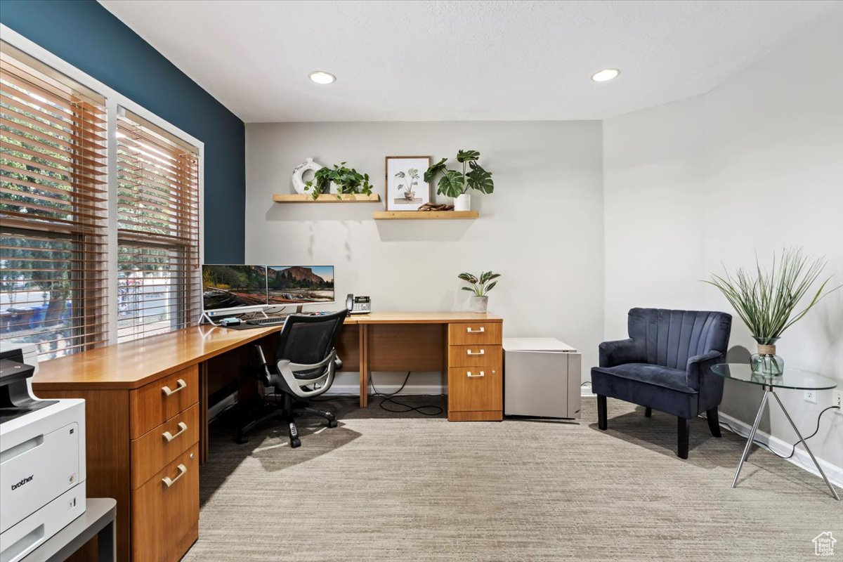 View of carpeted home office