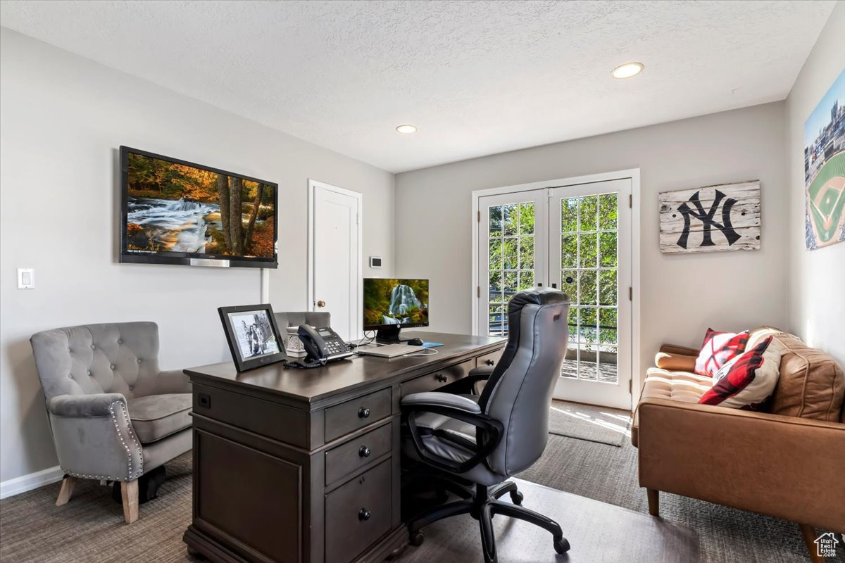 Home office with a textured ceiling