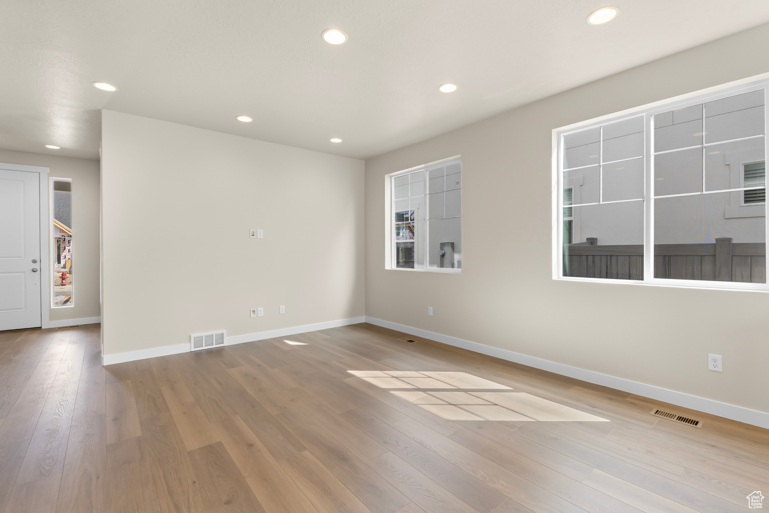 Spare room featuring light hardwood / wood-style flooring