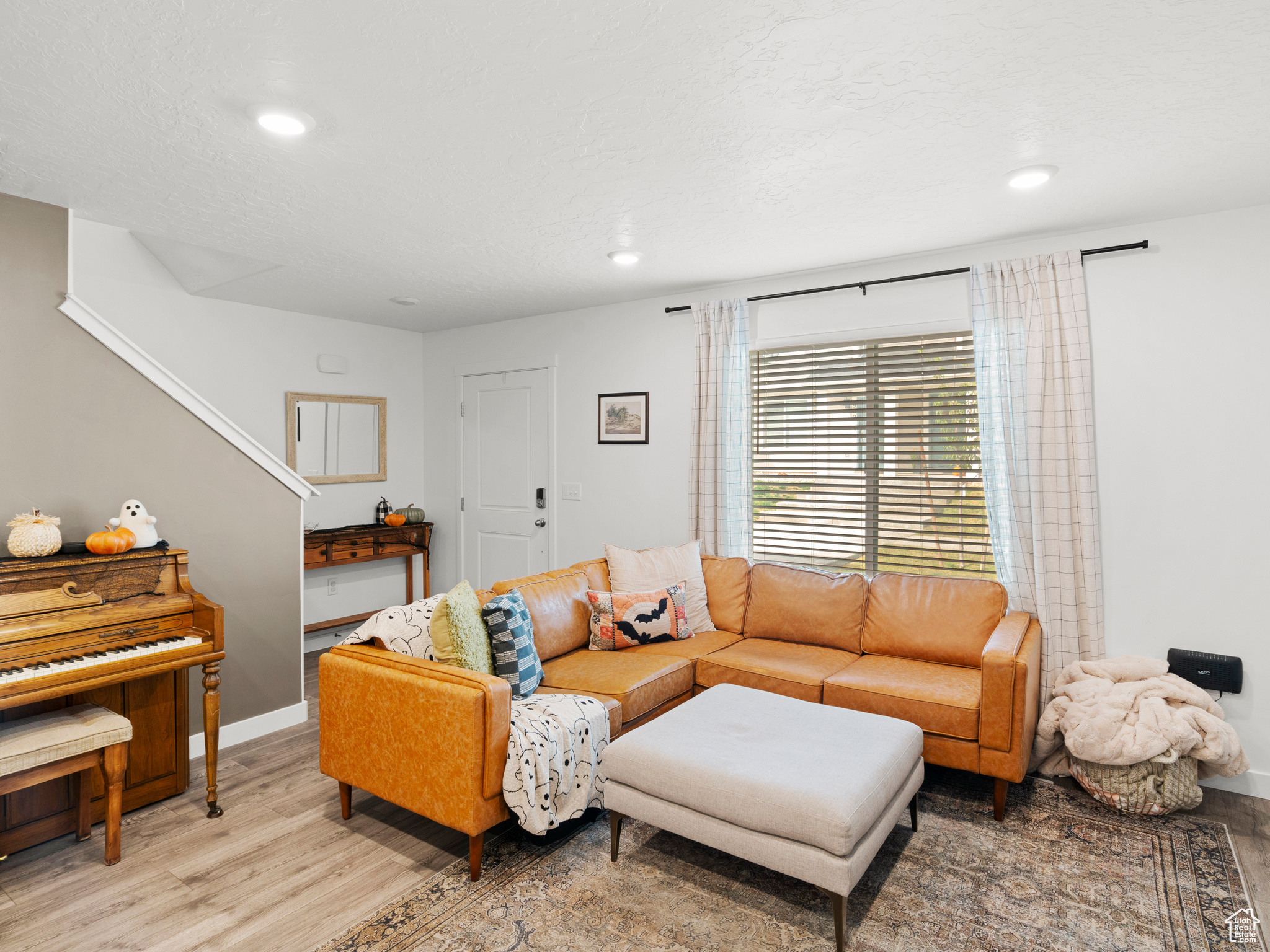 Living room featuring light hardwood / wood-style flooring