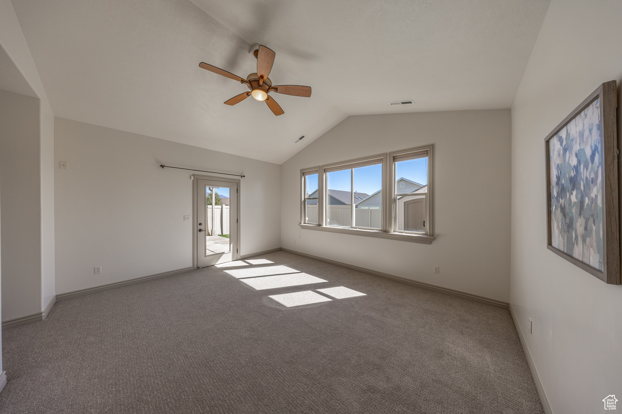 Primary bedroom with patio door