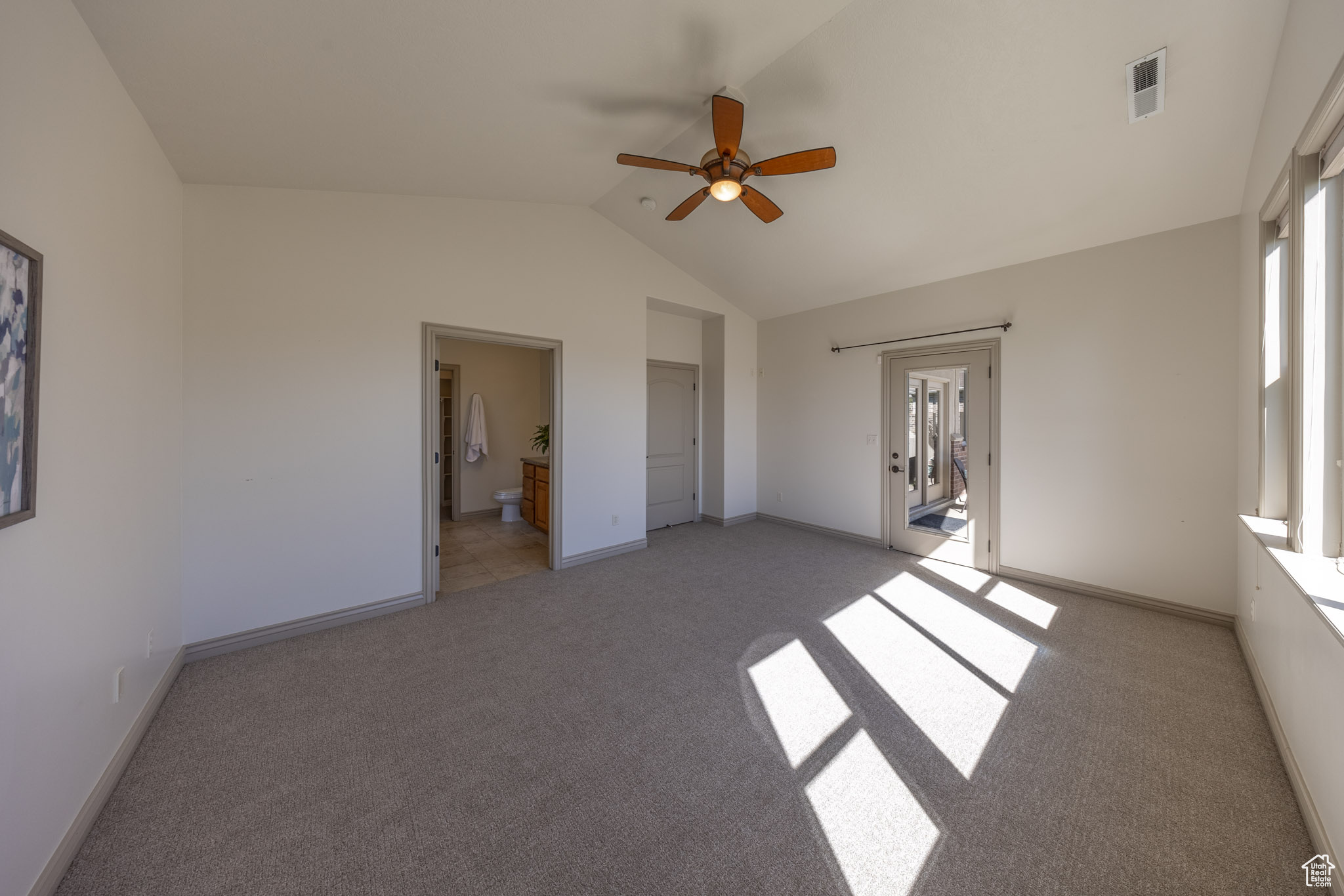 Primary bedroom with bathroom and closet