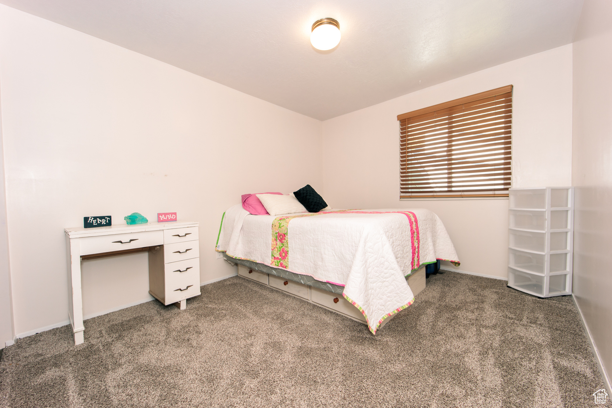 Bedroom featuring carpet