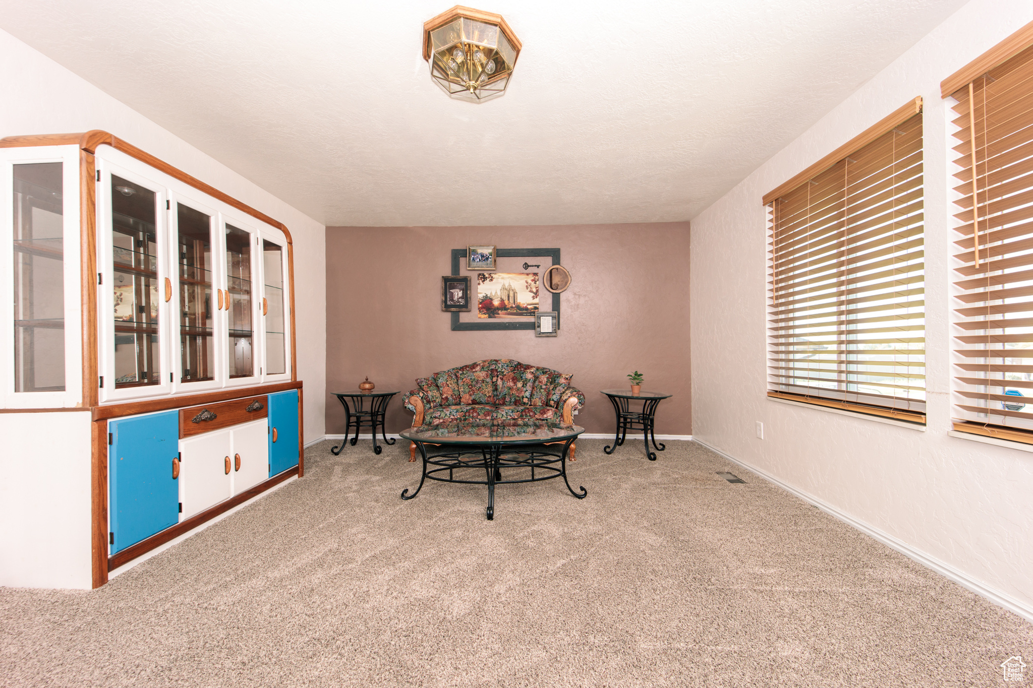 Living area featuring carpet flooring