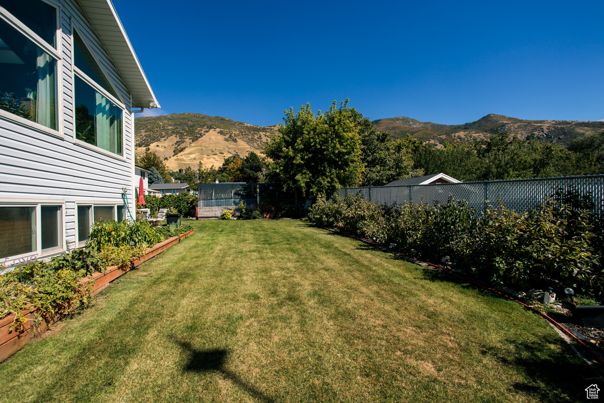 View of yard with a mountain view