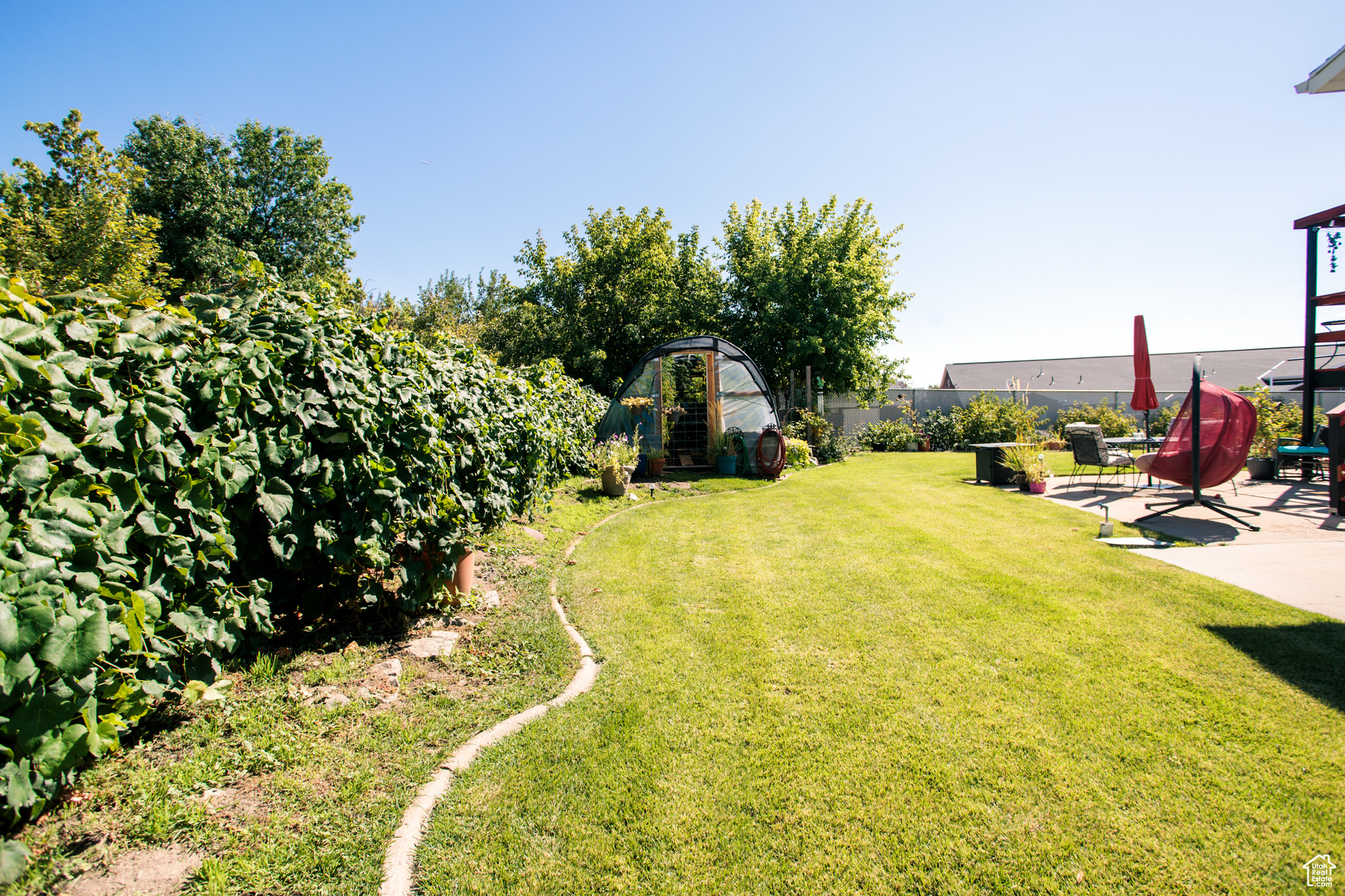 View of yard with a patio