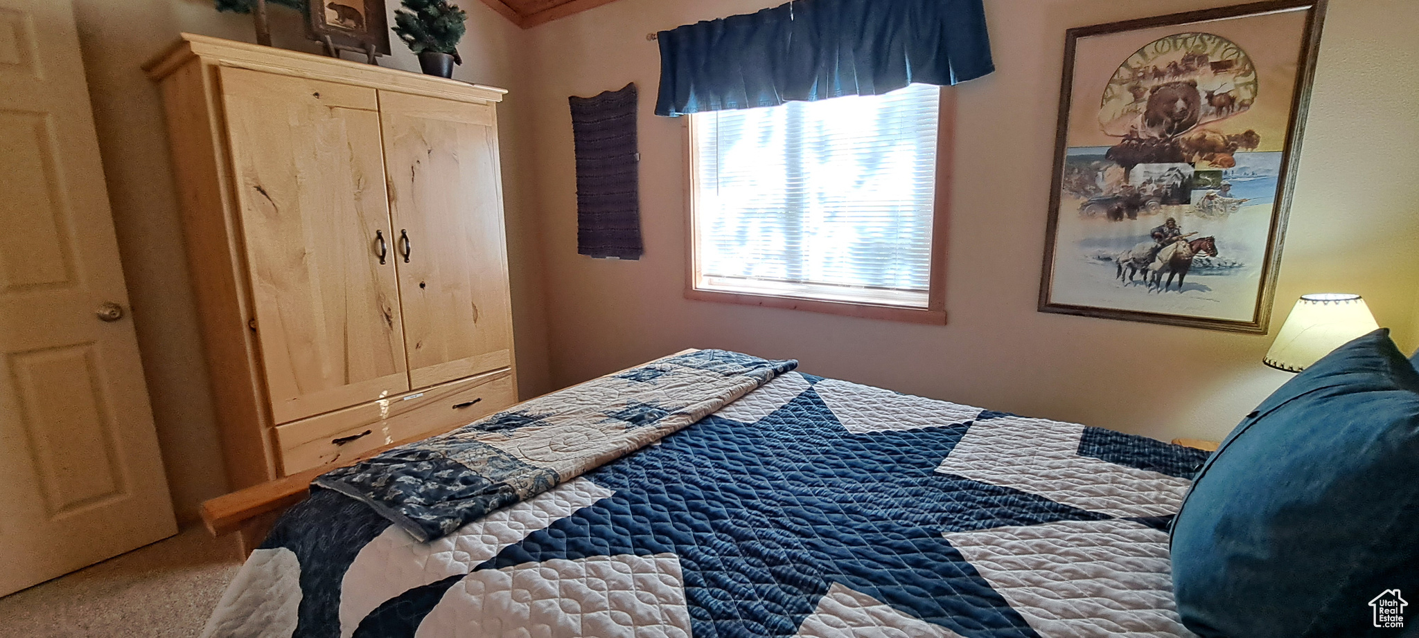 Bedroom with crown molding and carpet flooring