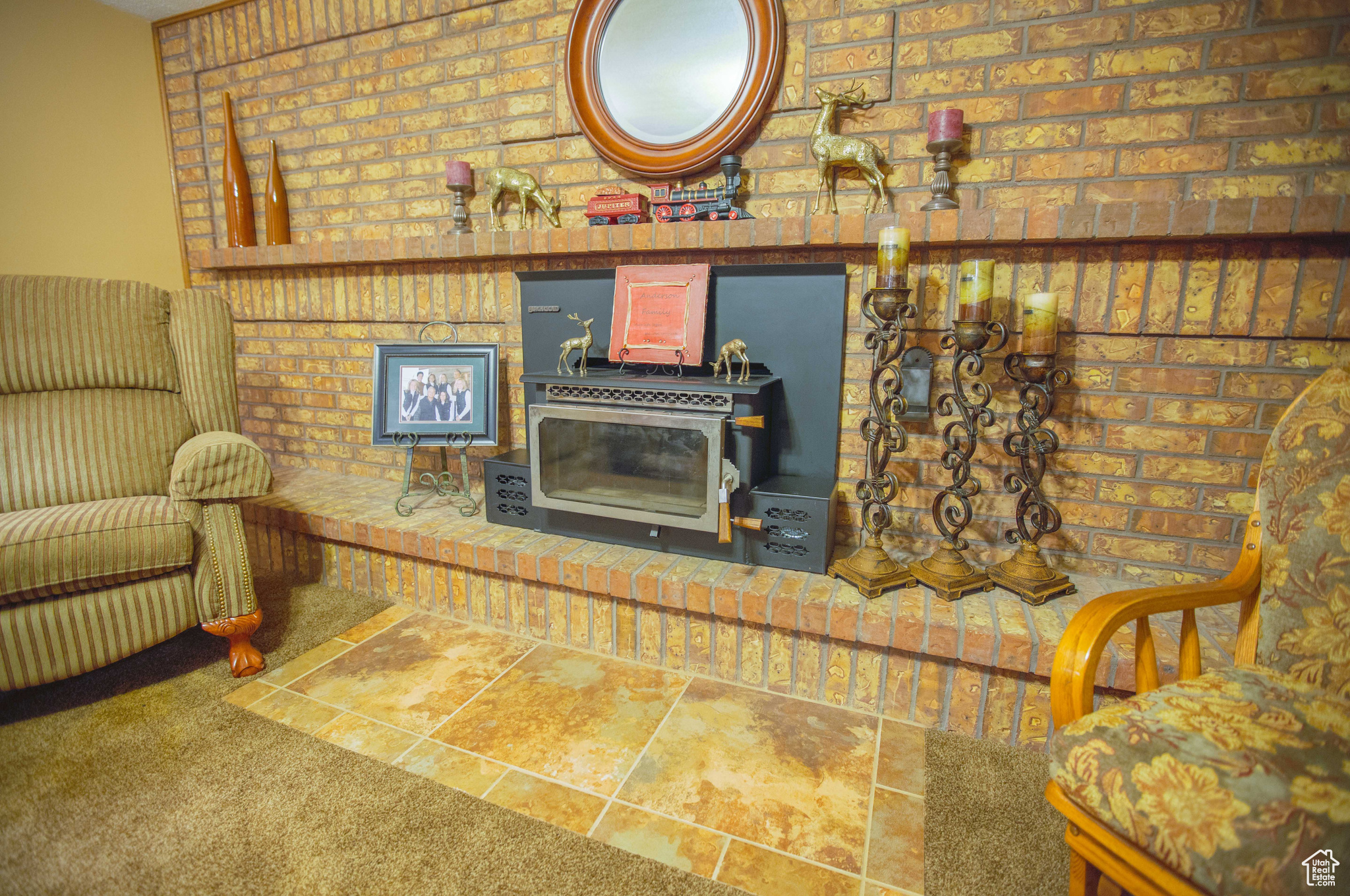 Basement family room with second wood-burning fireplace.